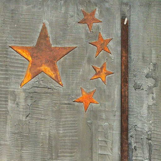 a metal american flag with five stars on it