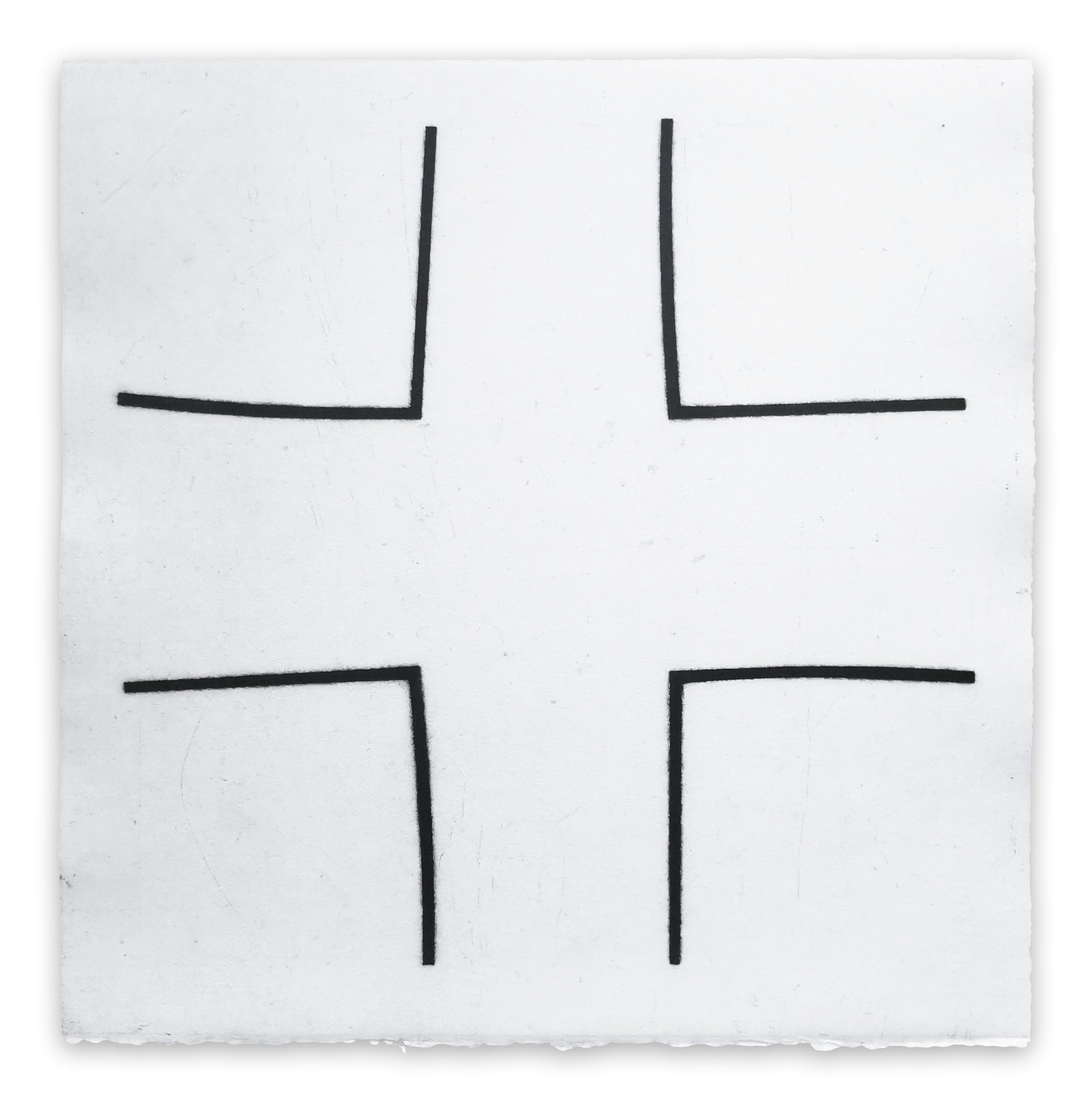 A set of four black and white squares on a white background.