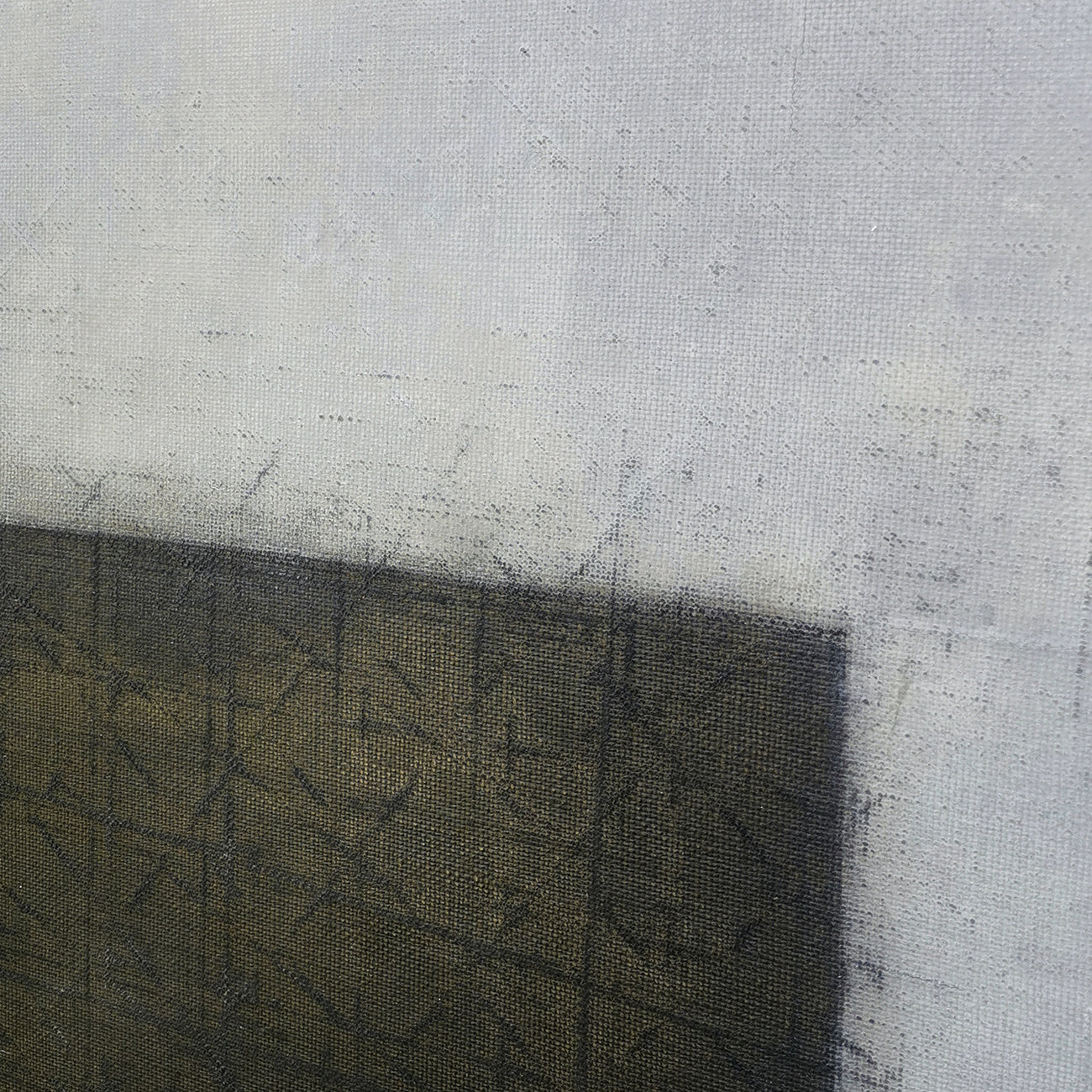 A black and white painting of a cross on a gray background.