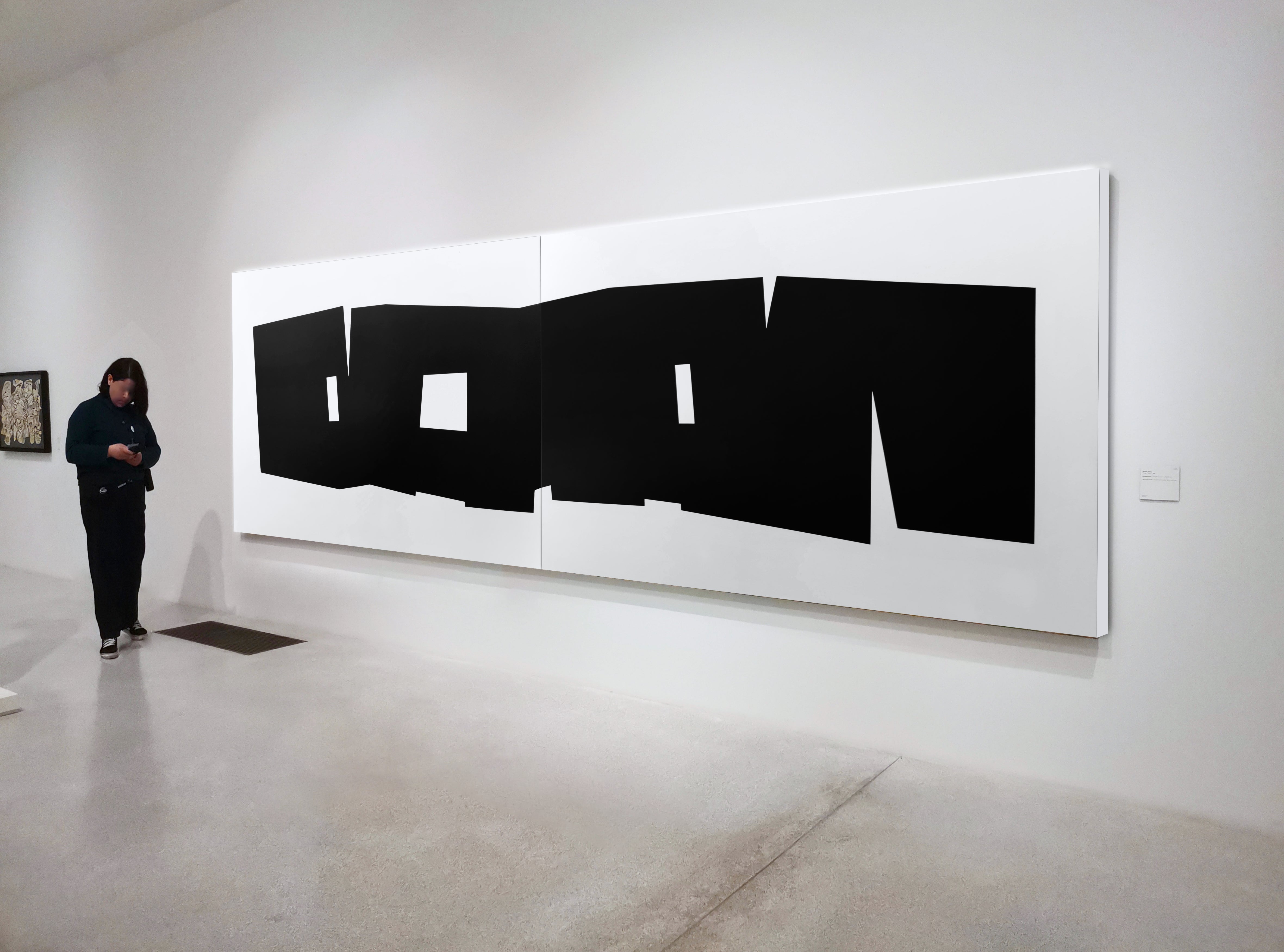 A black and white poster with the word DON cut out of it.