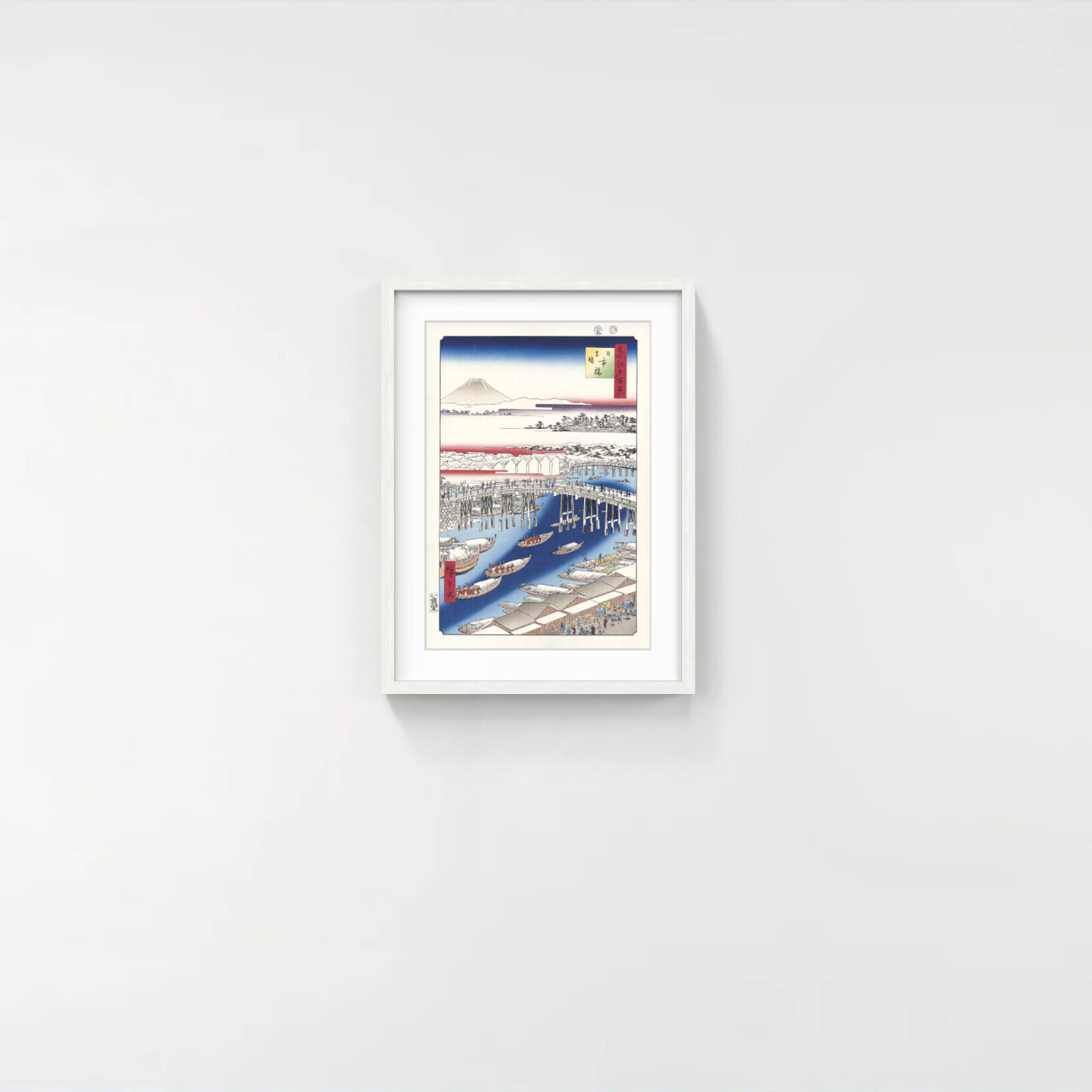 A vibrant woodblock print of a bustling river scene with a long bridge, boats, and distant mountains under a dramatic sky.