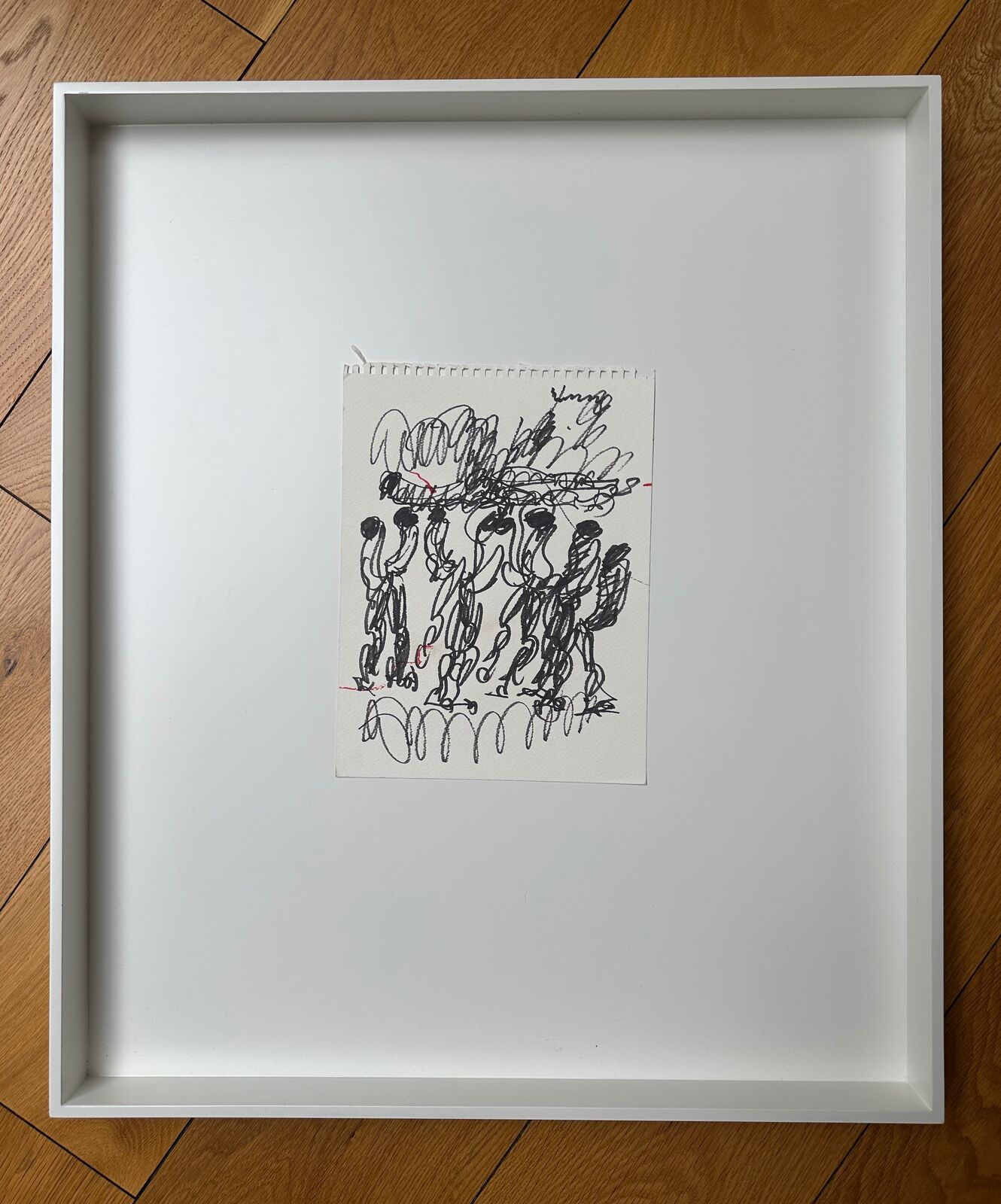 A drawing of a group of people holding hands in the air.