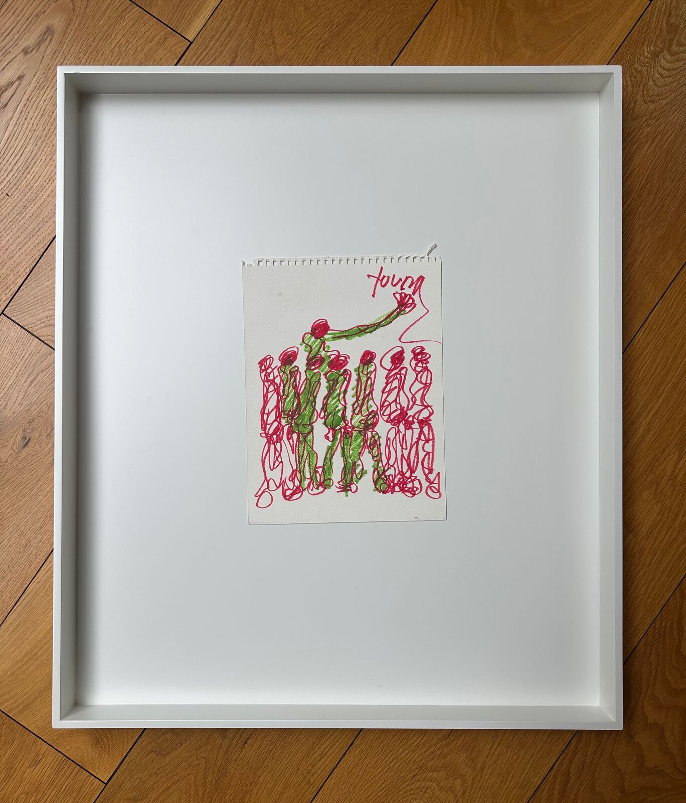 A drawing of a group of people holding hands in the air.