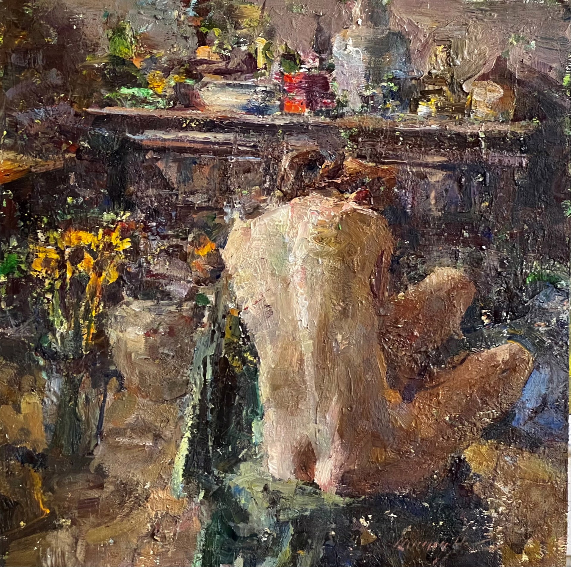 A painting of a naked woman sitting in front of a fireplace.