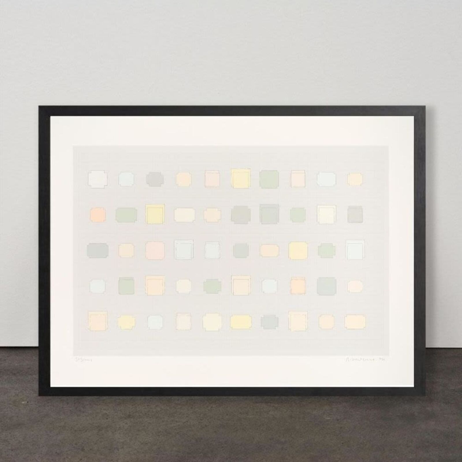 A framed print of a white wall with a black frame.