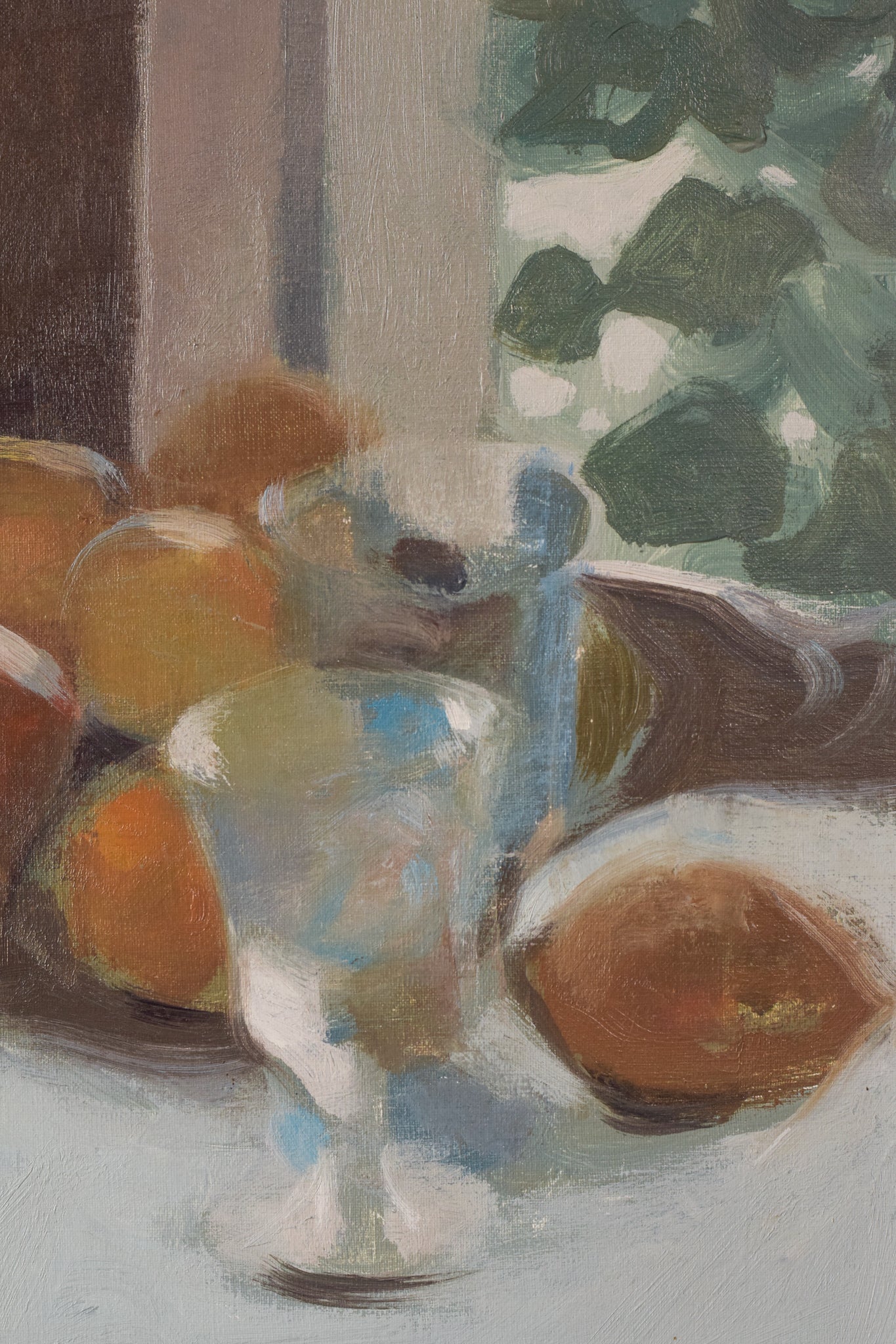 A painting of a woman sitting at a table with a book and a vase of flowers.