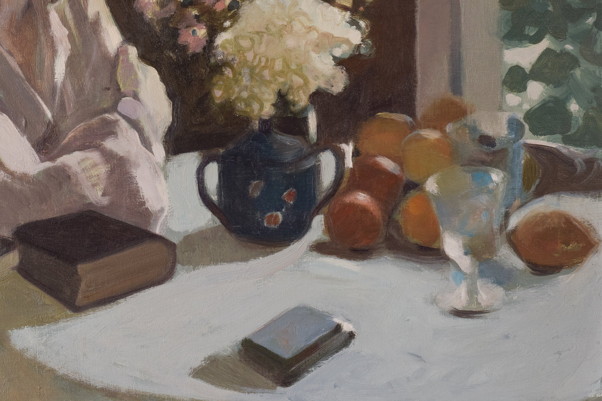 A painting of a woman sitting at a table with a book and a vase of flowers.