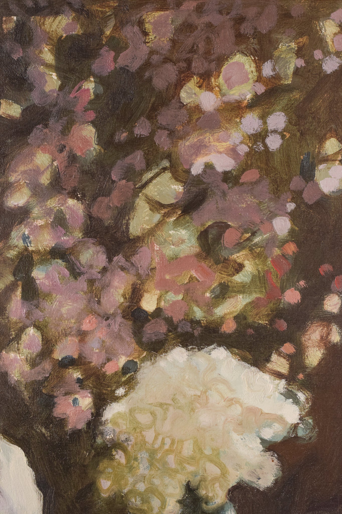 A painting of a woman sitting at a table with a book and a vase of flowers.