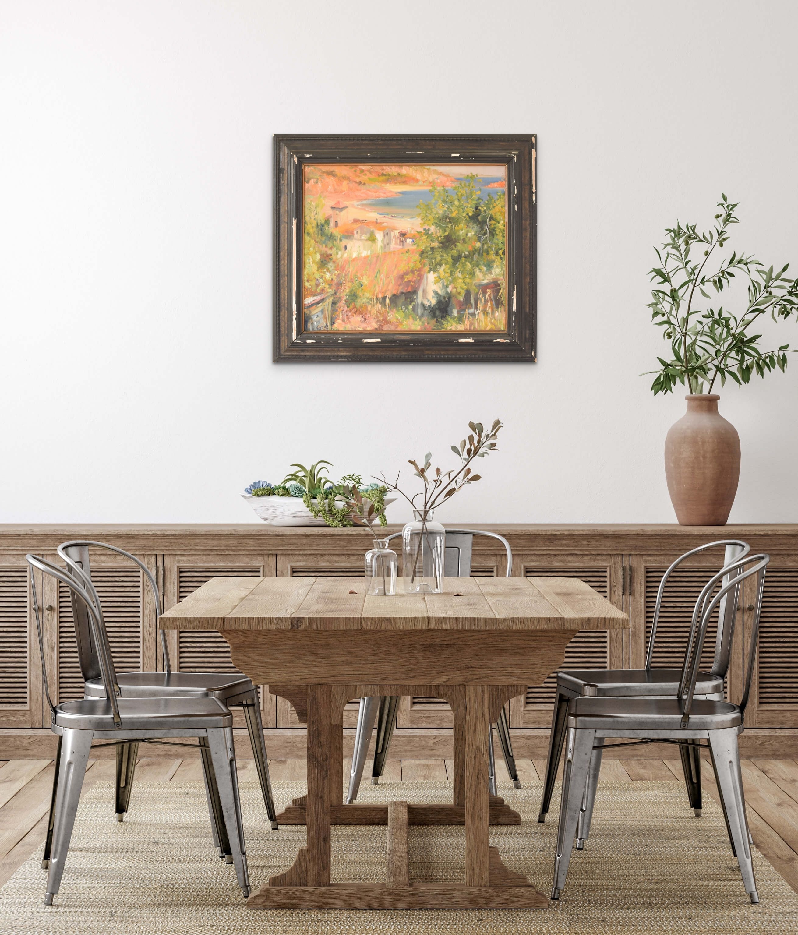 A painting of a view of a small town by the ocean.
