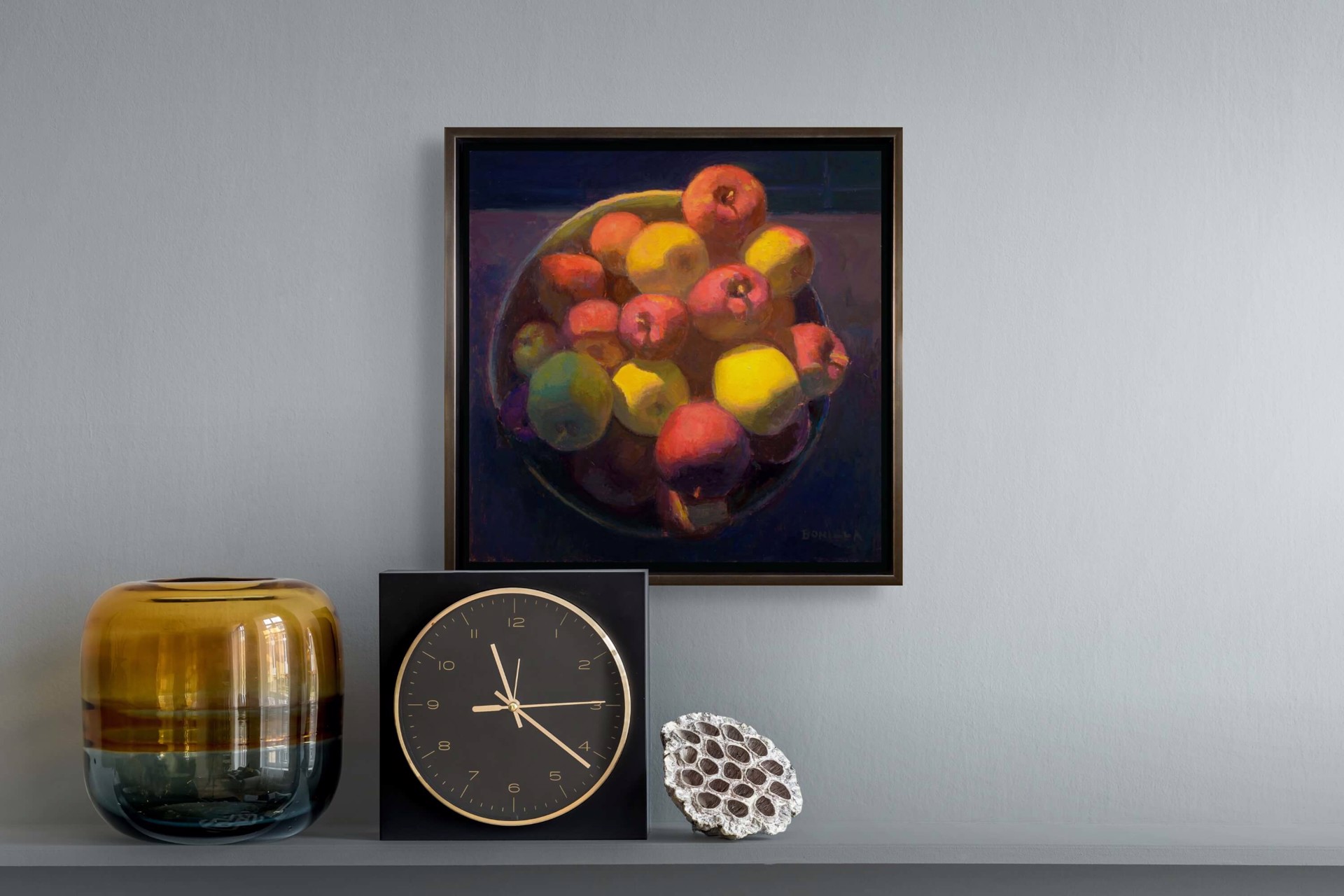 A painting of apples and lemons in a bowl on a table.