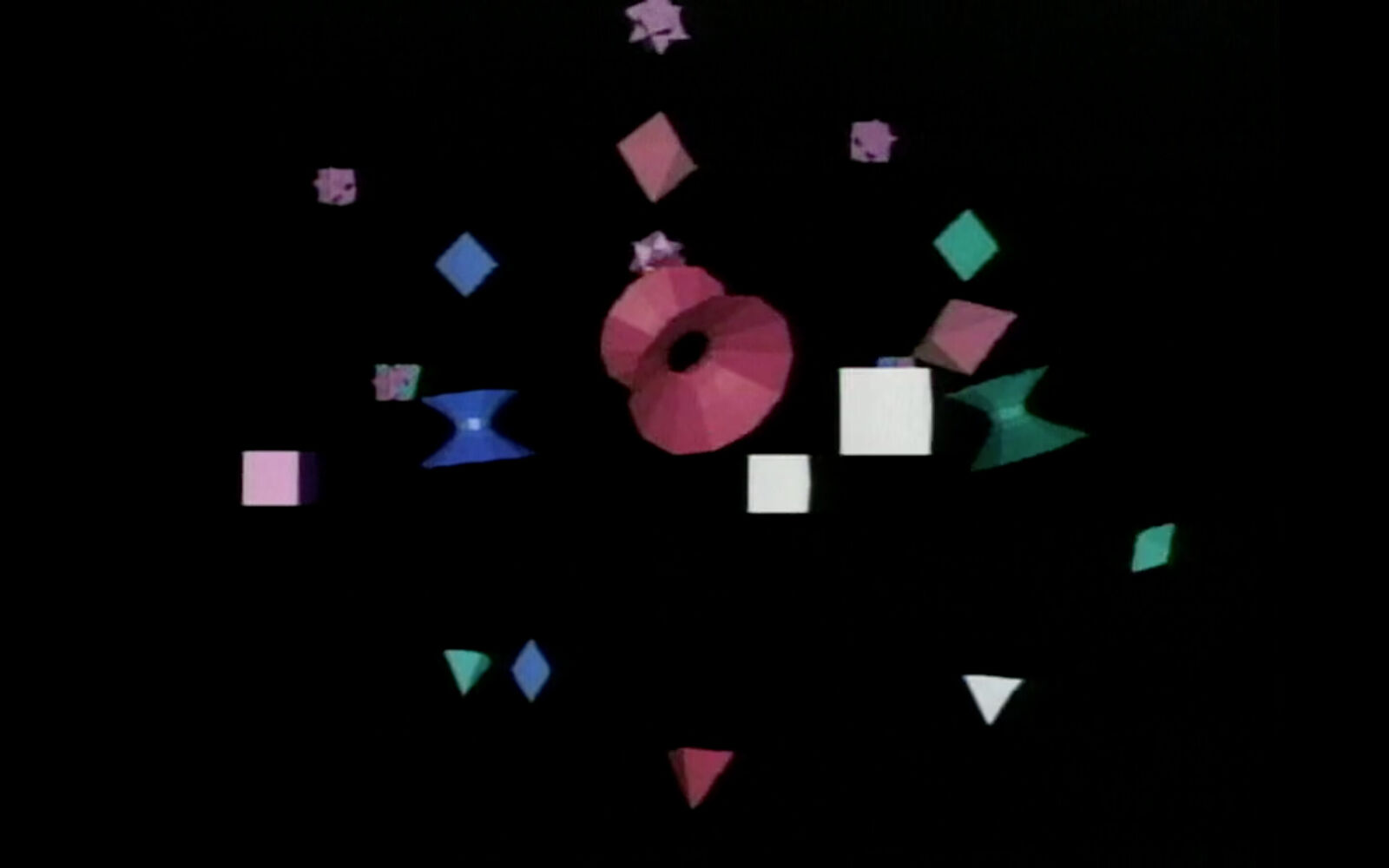 A black background with a bunch of different colored paper shapes.