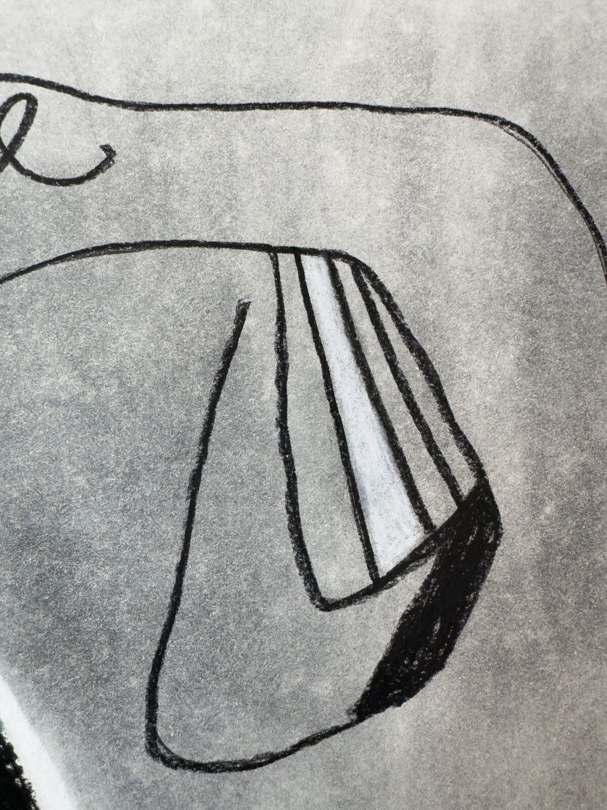A monochromatic drawing of a still life featuring a striped chair, a book, and a pen on a gray background.