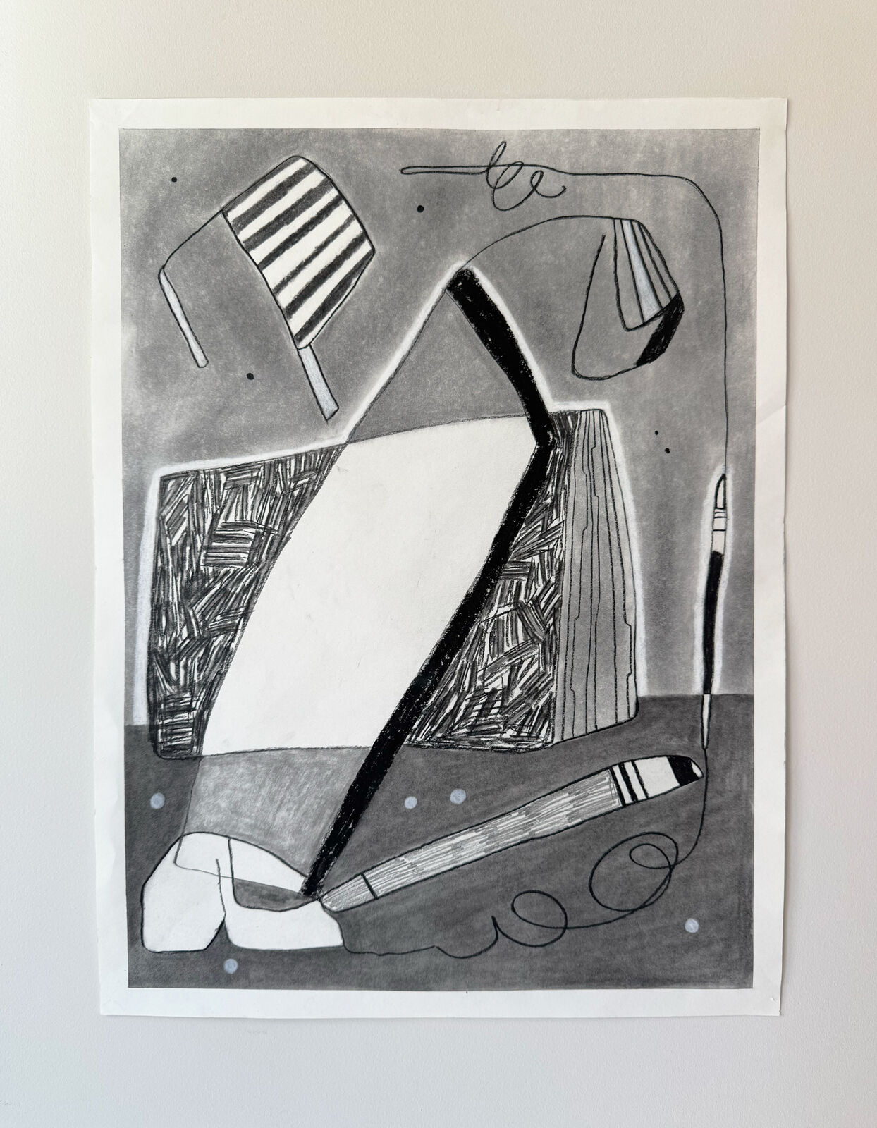 A monochromatic drawing of a still life featuring a striped chair, a book, and a pen on a gray background.