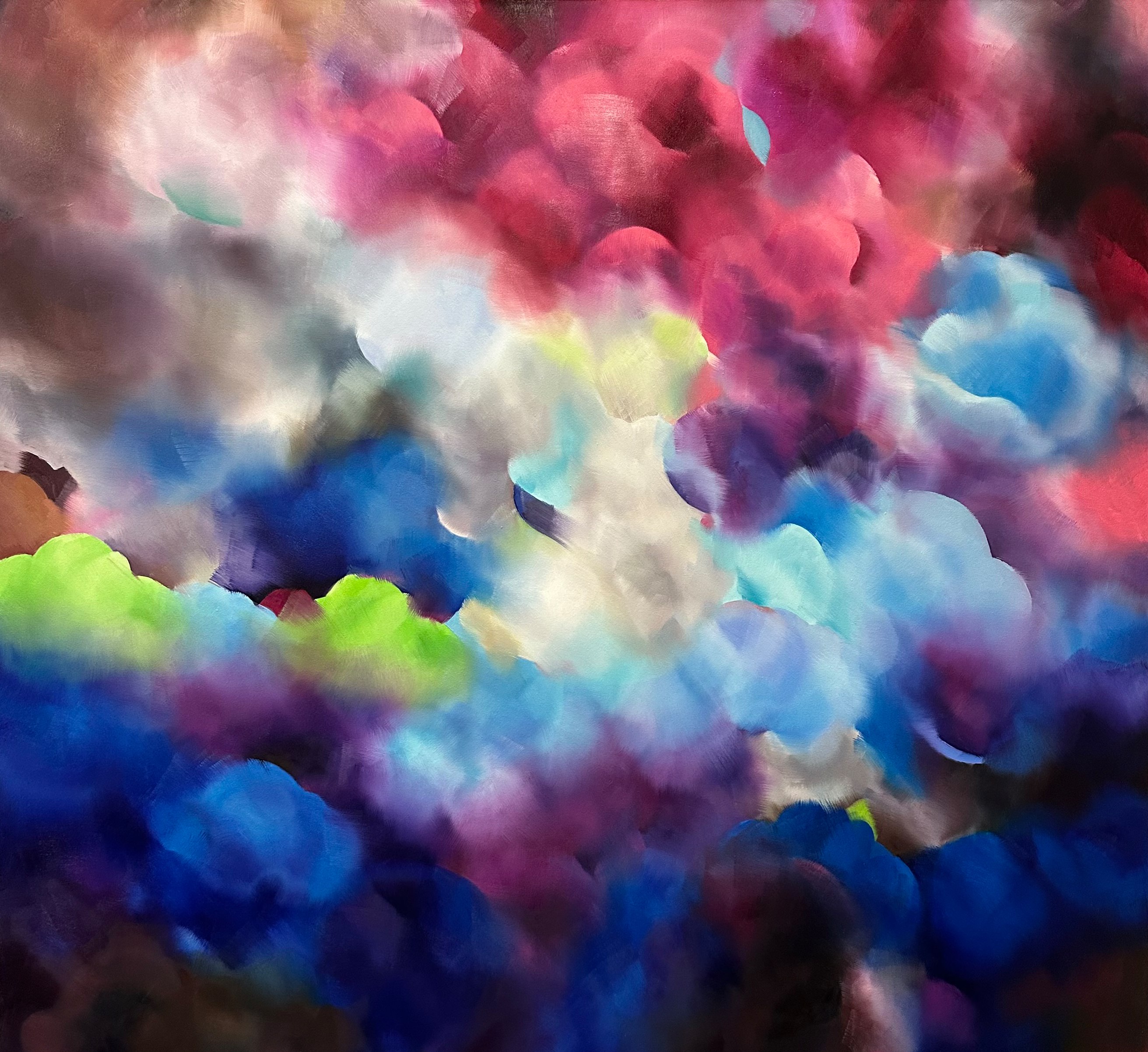 A painting of colorful clouds in the sky. 
