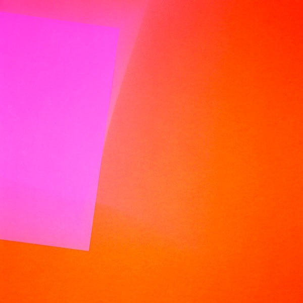 An orange and pink abstract painting on a white background.