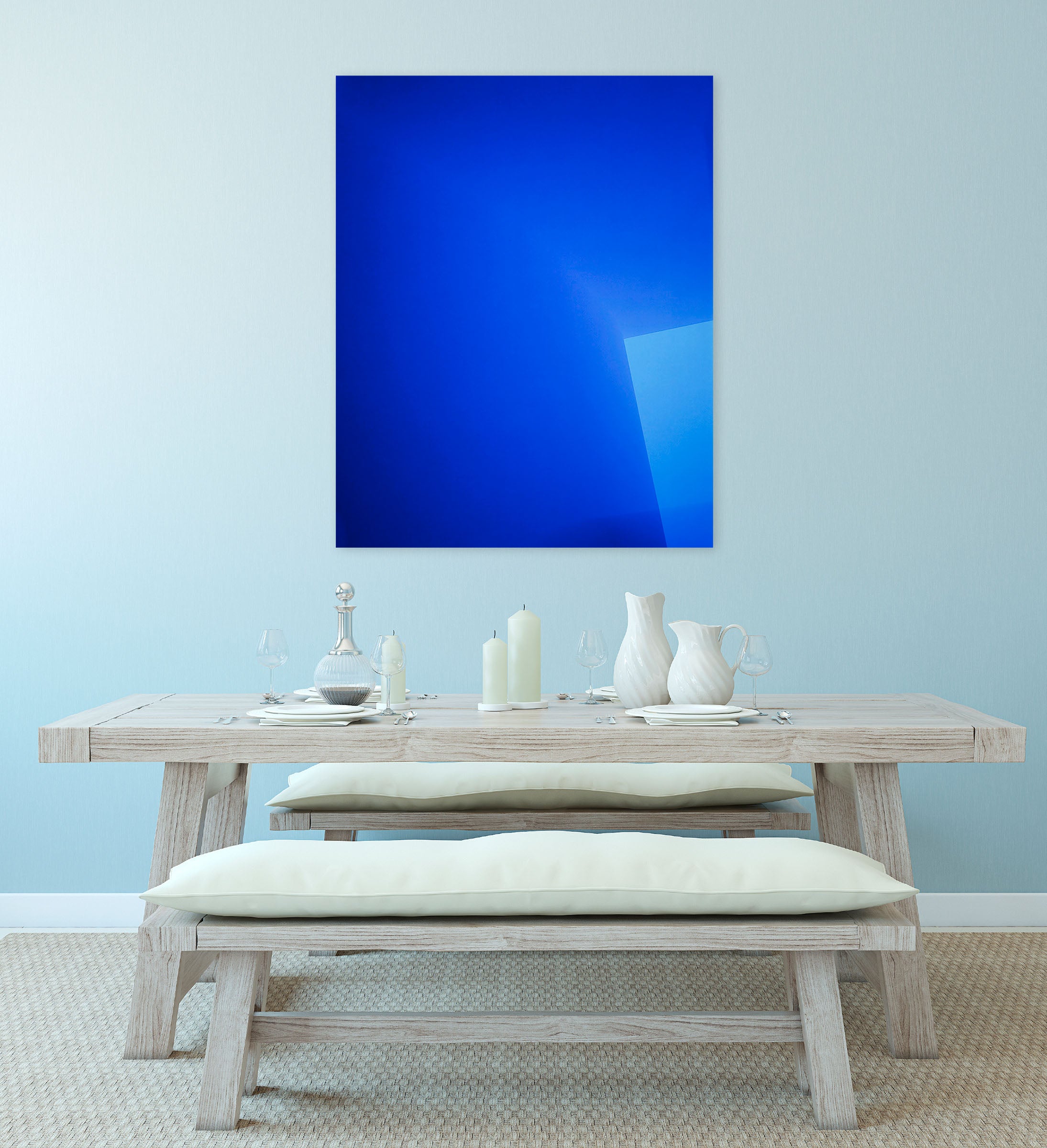 A blue square with a white border on a white background.