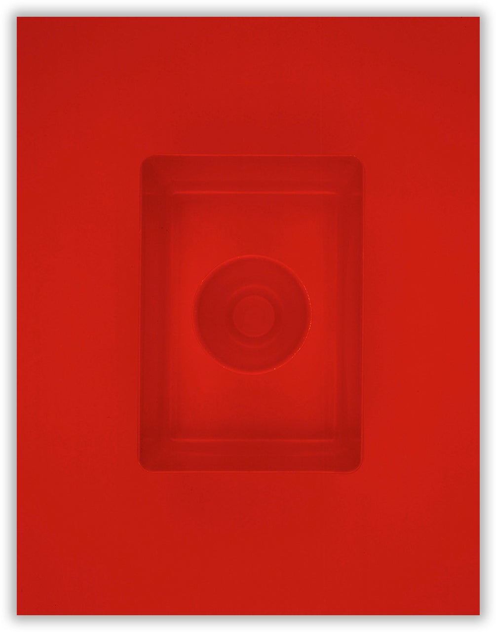 A red square with a circle in the middle of it.