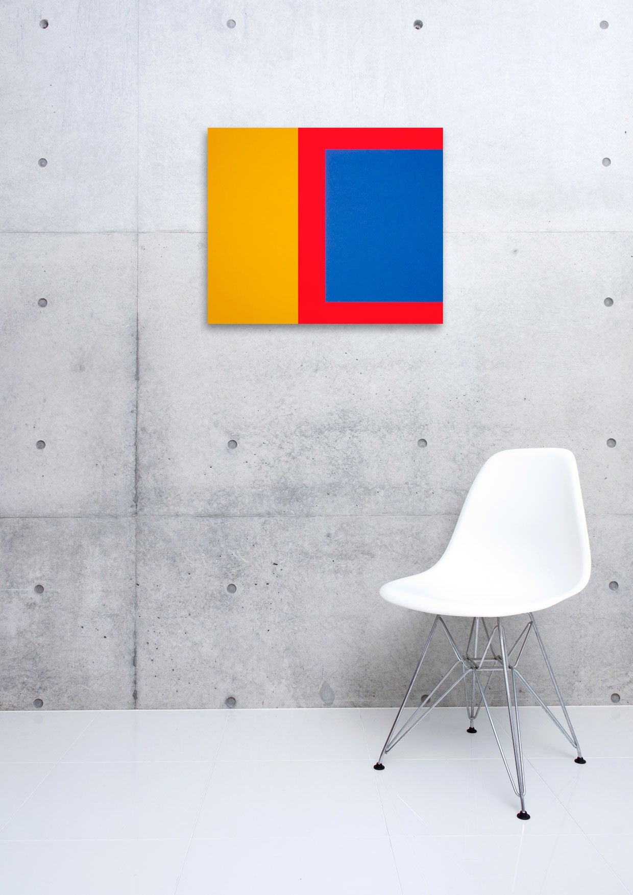 A red, yellow and blue square on a white background.