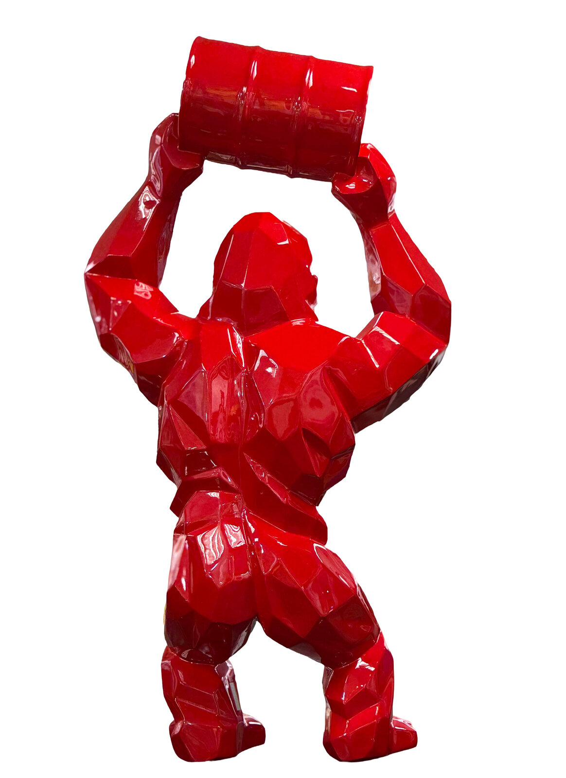 A glossy red gorilla figure lifting a barrel overhead in a low-poly style.