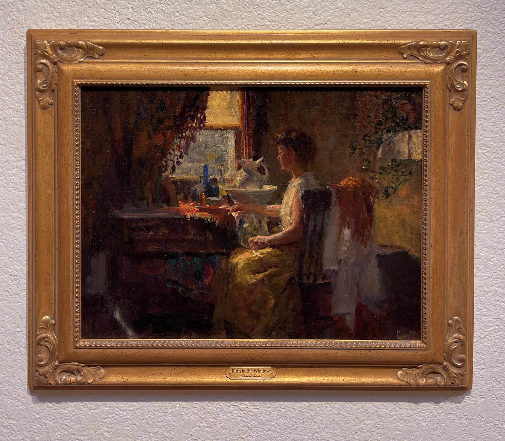 A painting of a woman sitting at a table in front of a window.