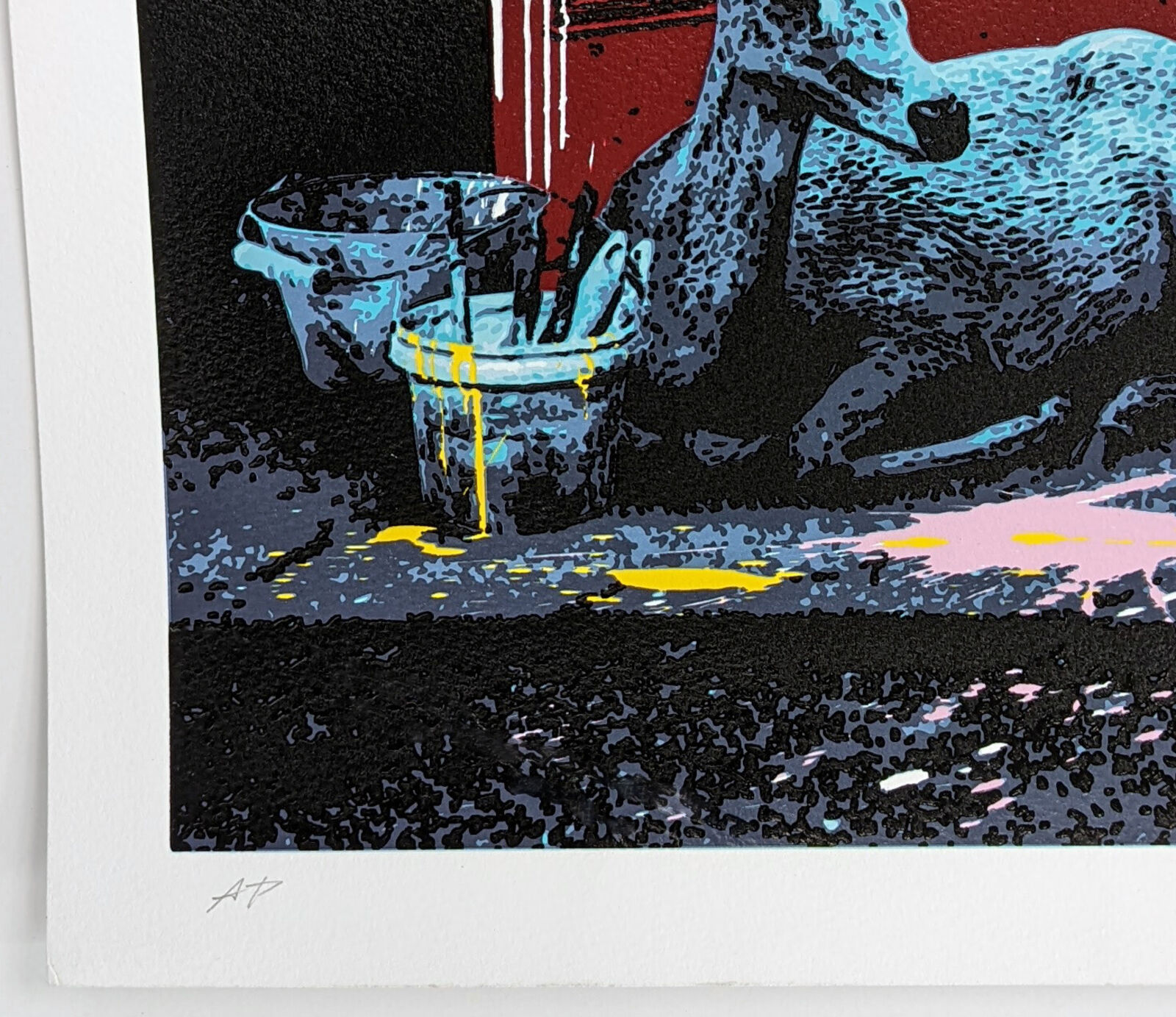 A picture of a person sitting on top of a phone booth.