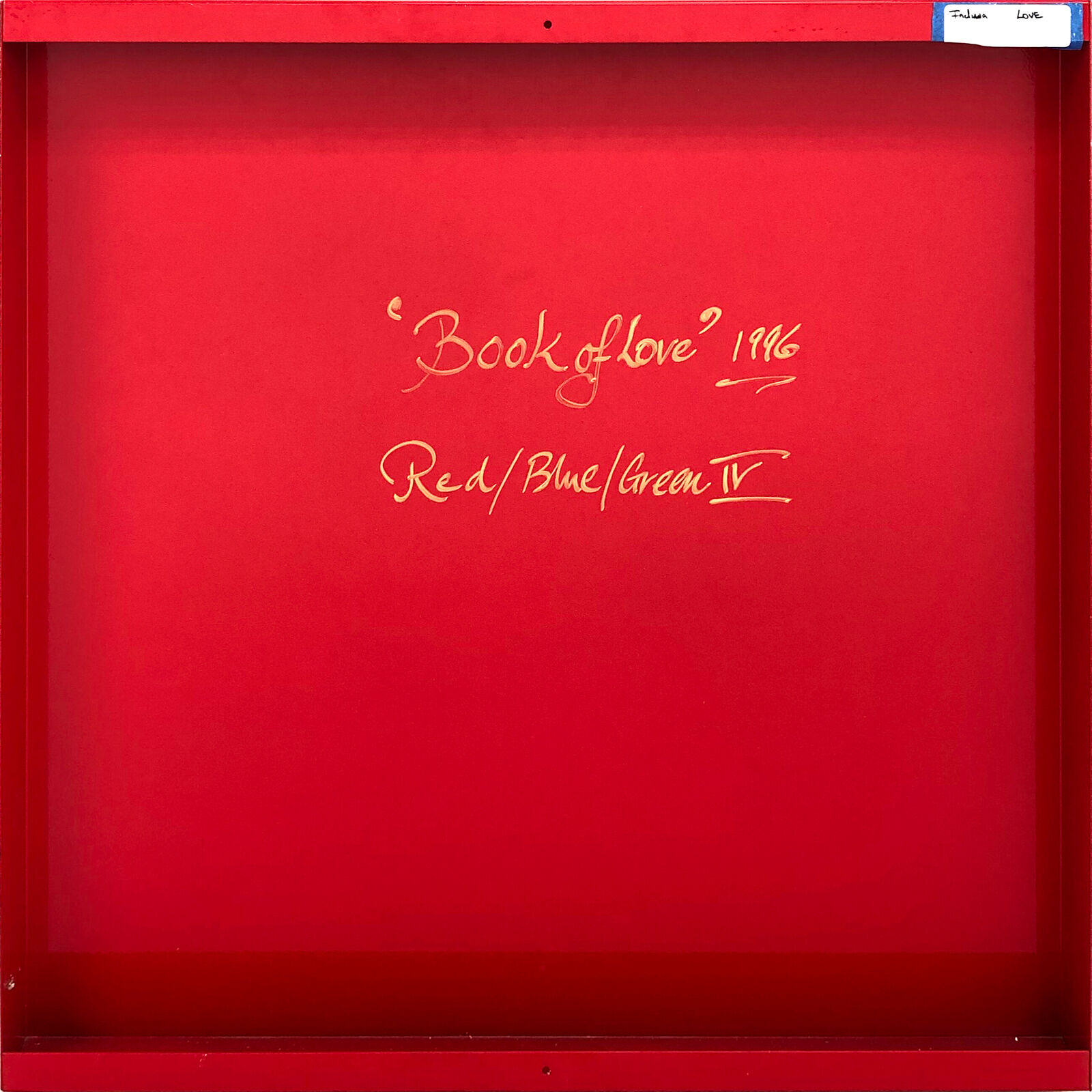 A red, blue and green love sign on a white background.