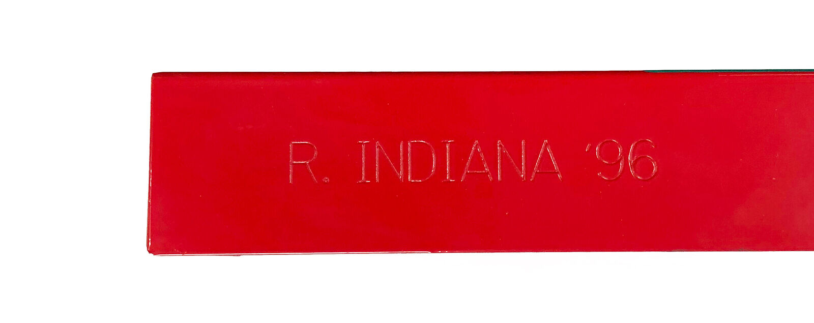 A red, blue and green love sign on a white background.