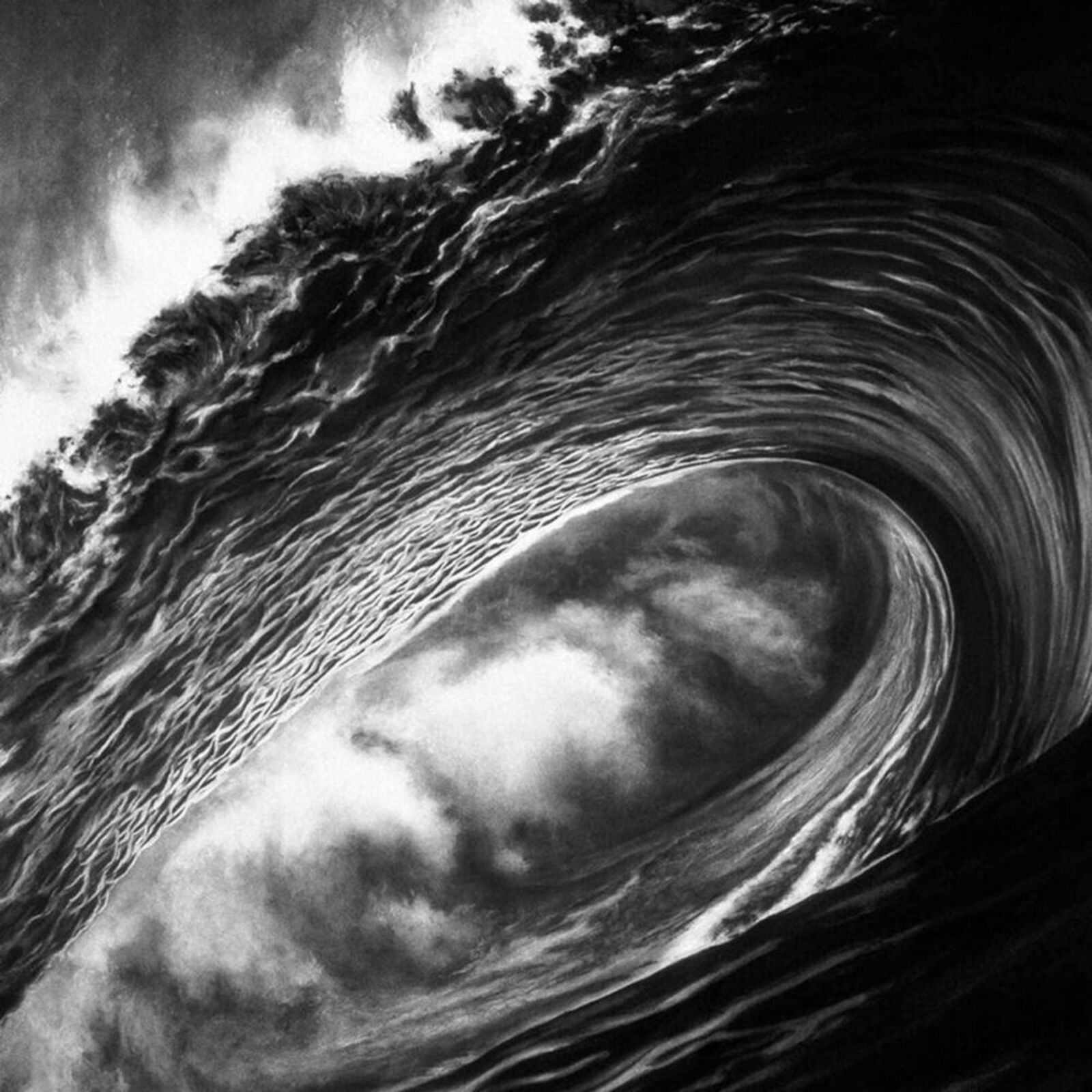 A black and white photo of a large wave in the ocean.