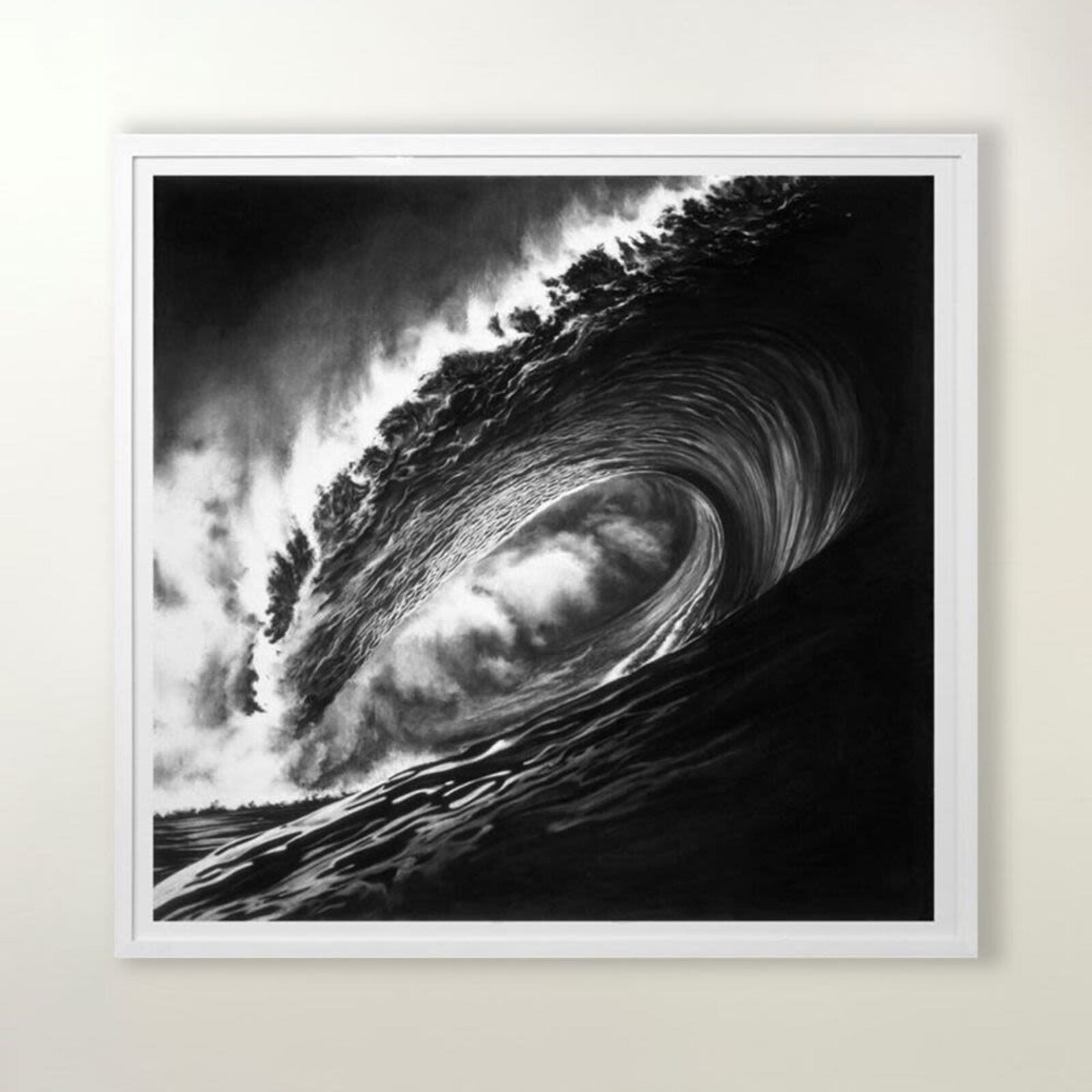 A black and white photo of a large wave in the ocean.