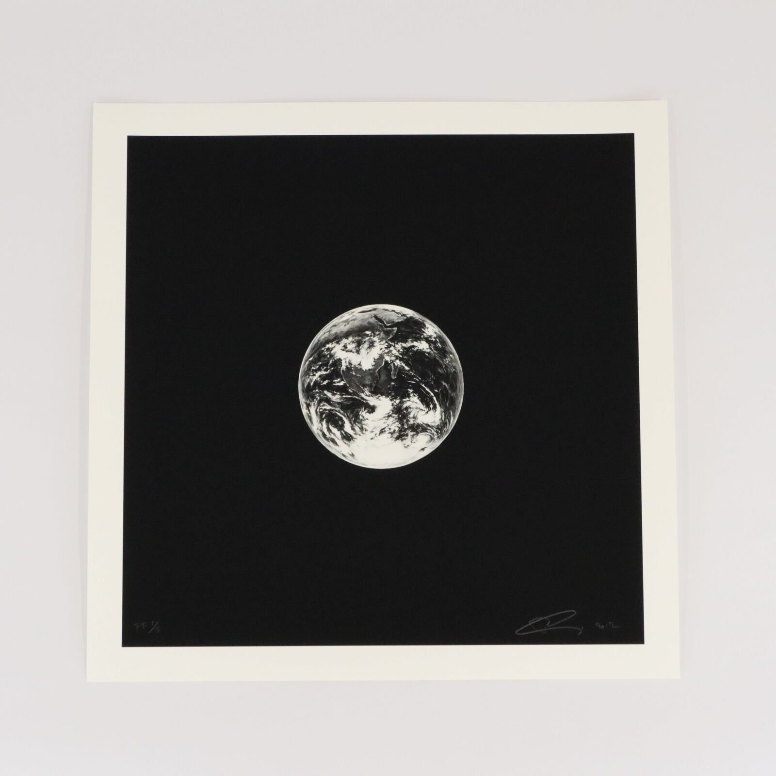 A black and white photo of the earth.