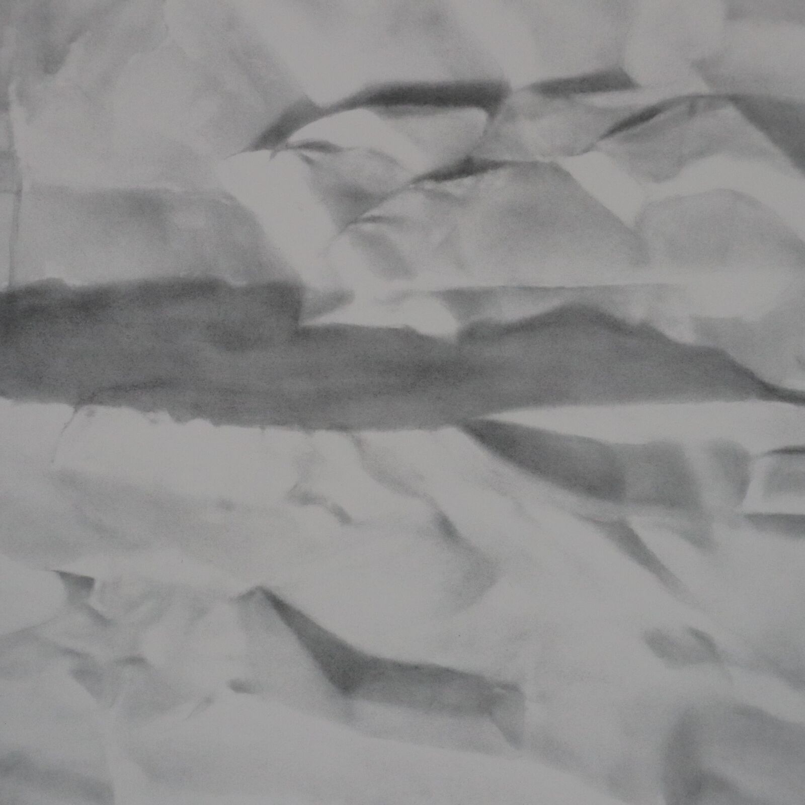 A black and white photo of a large piece of paper.