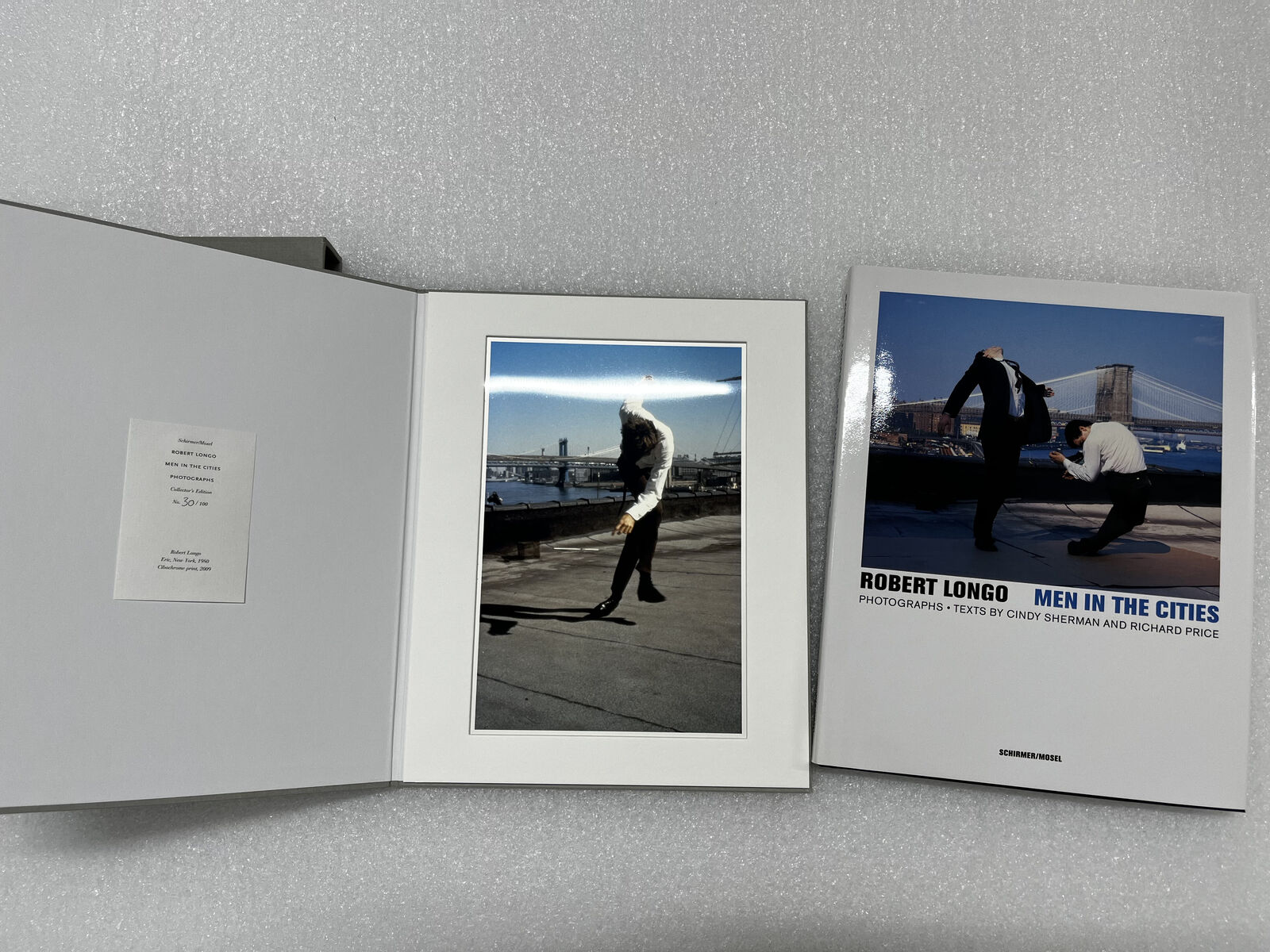 A dynamic street dance performance against an urban waterfront backdrop.
