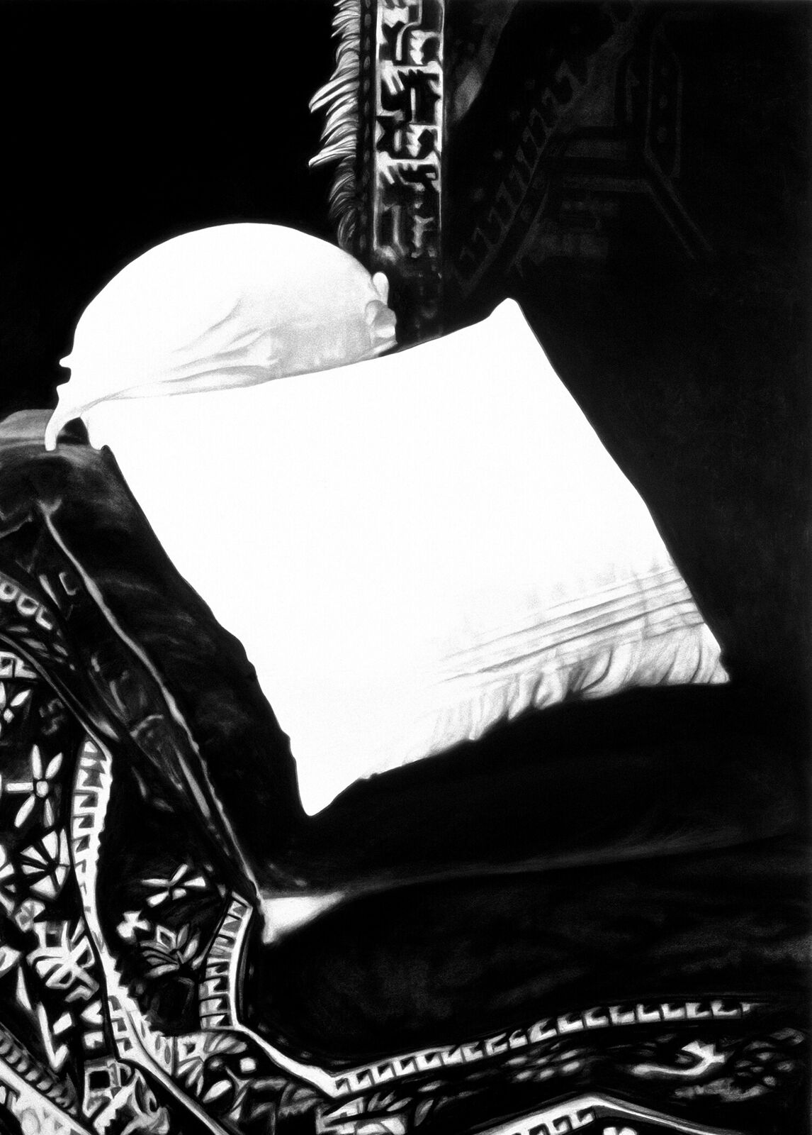 A gallery wall of black and white framed photographs showcasing interior details.