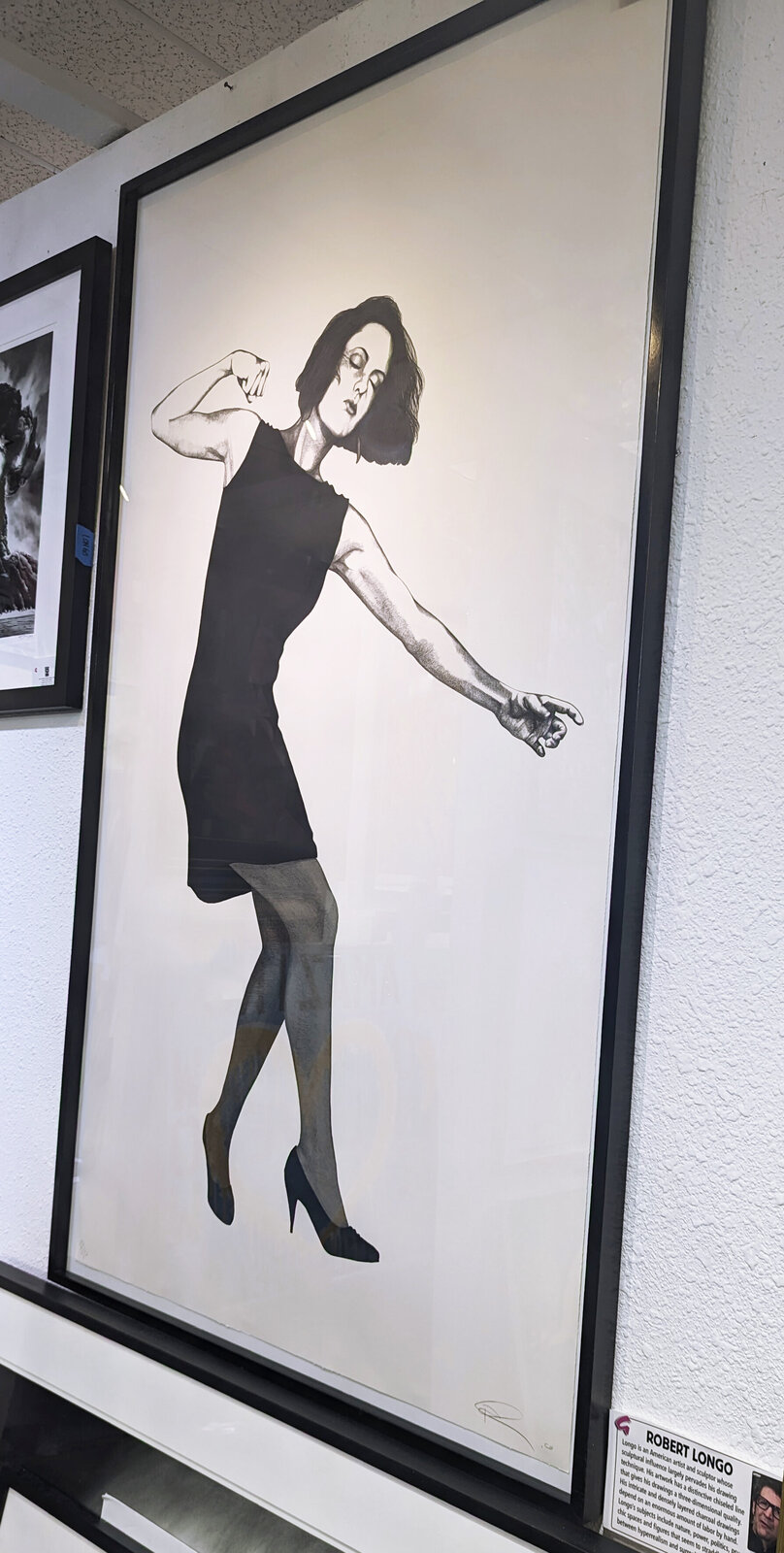 A dynamic black-and-white drawing of a figure in motion, captured mid-dance with expressive energy.