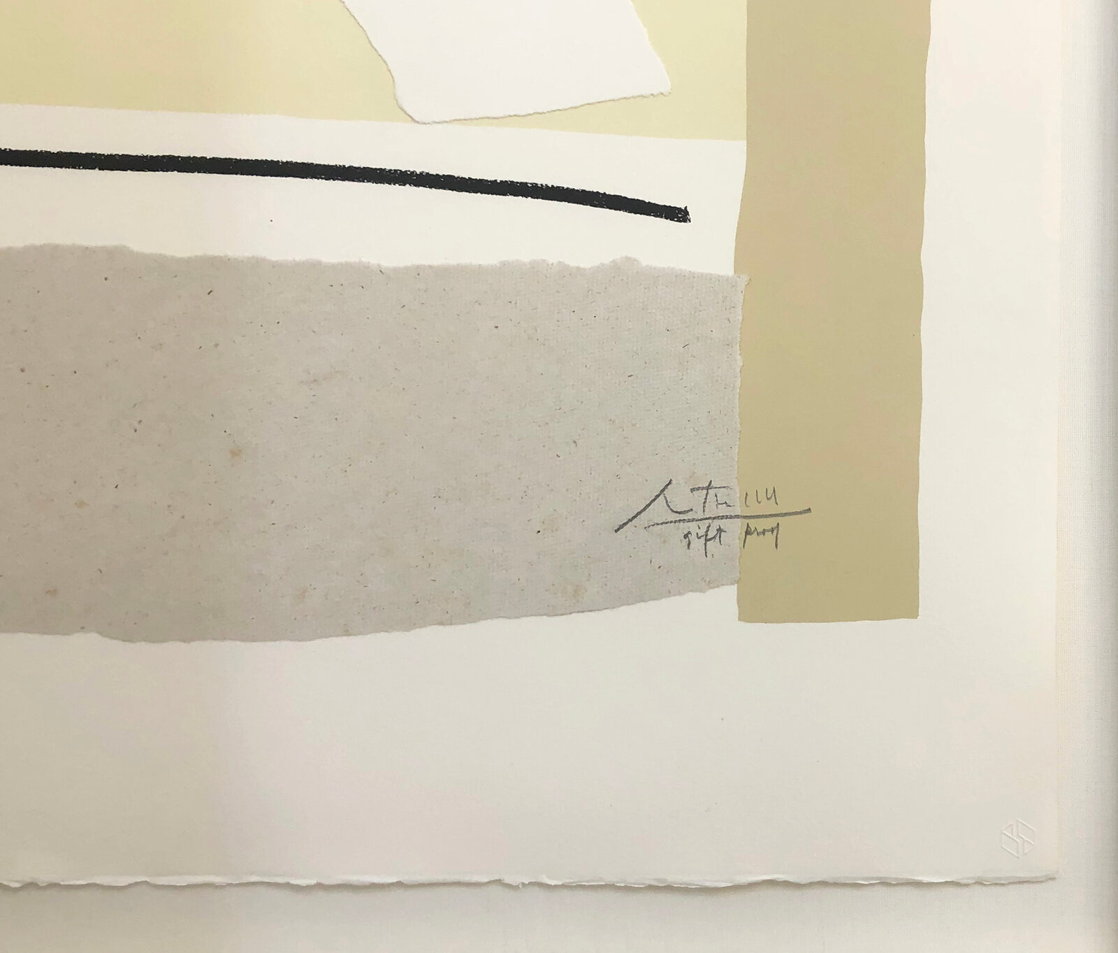 A graphic print featuring a torn paper label with a green logo against a layered abstract composition.