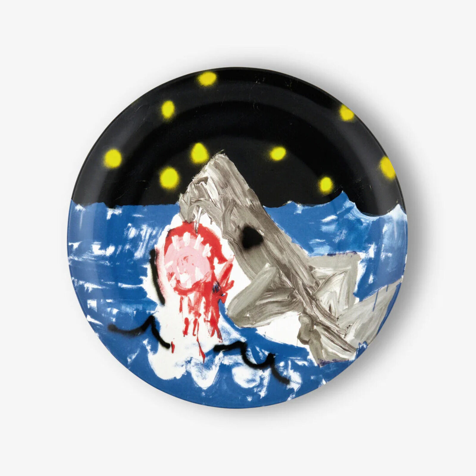 A plate with a painting of a spaceship flying over the ocean.
