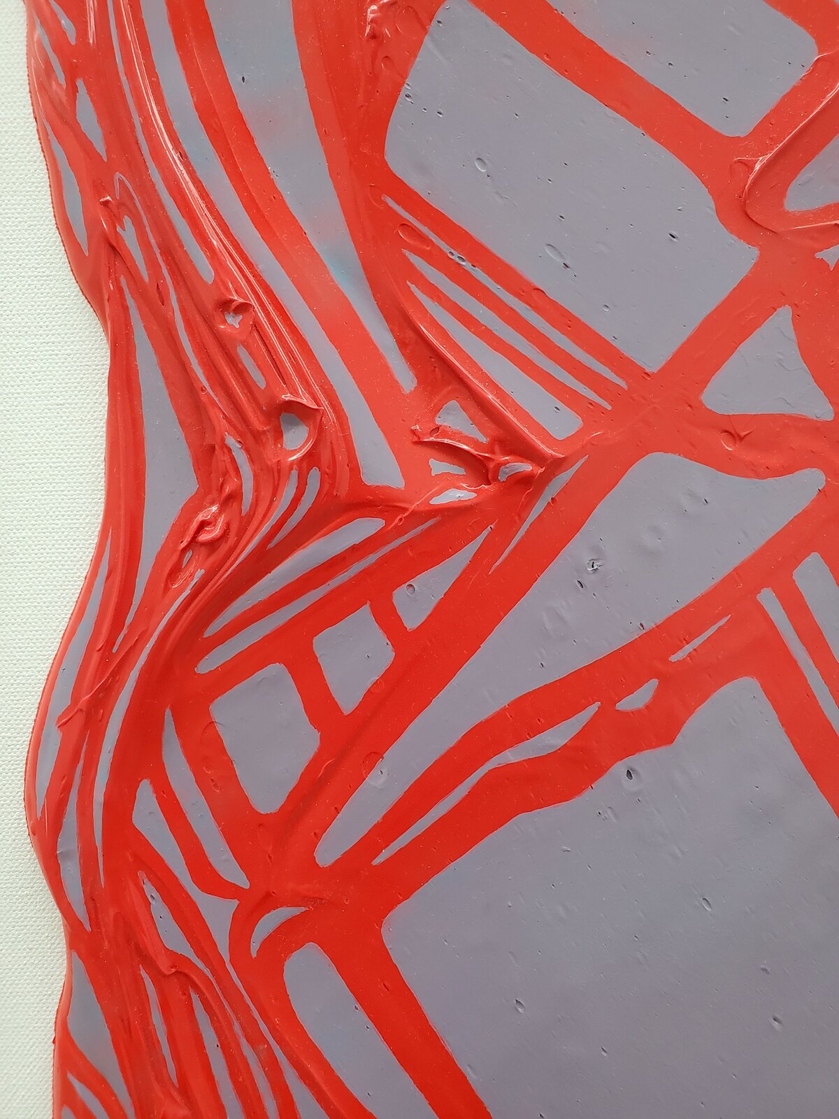 A textured abstract piece featuring a red, organic network over a translucent purple background.