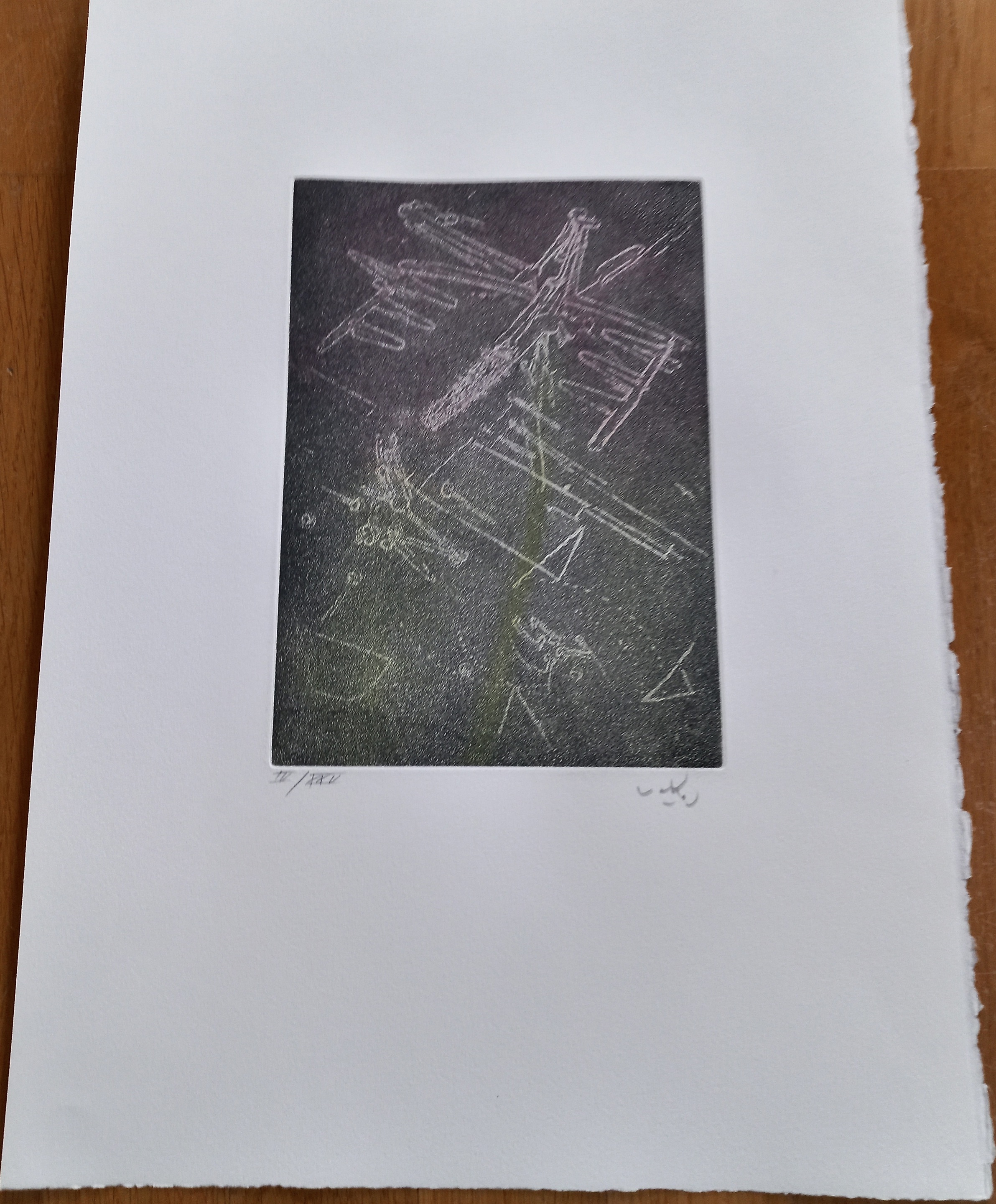 A black and white drawing on a piece of paper.