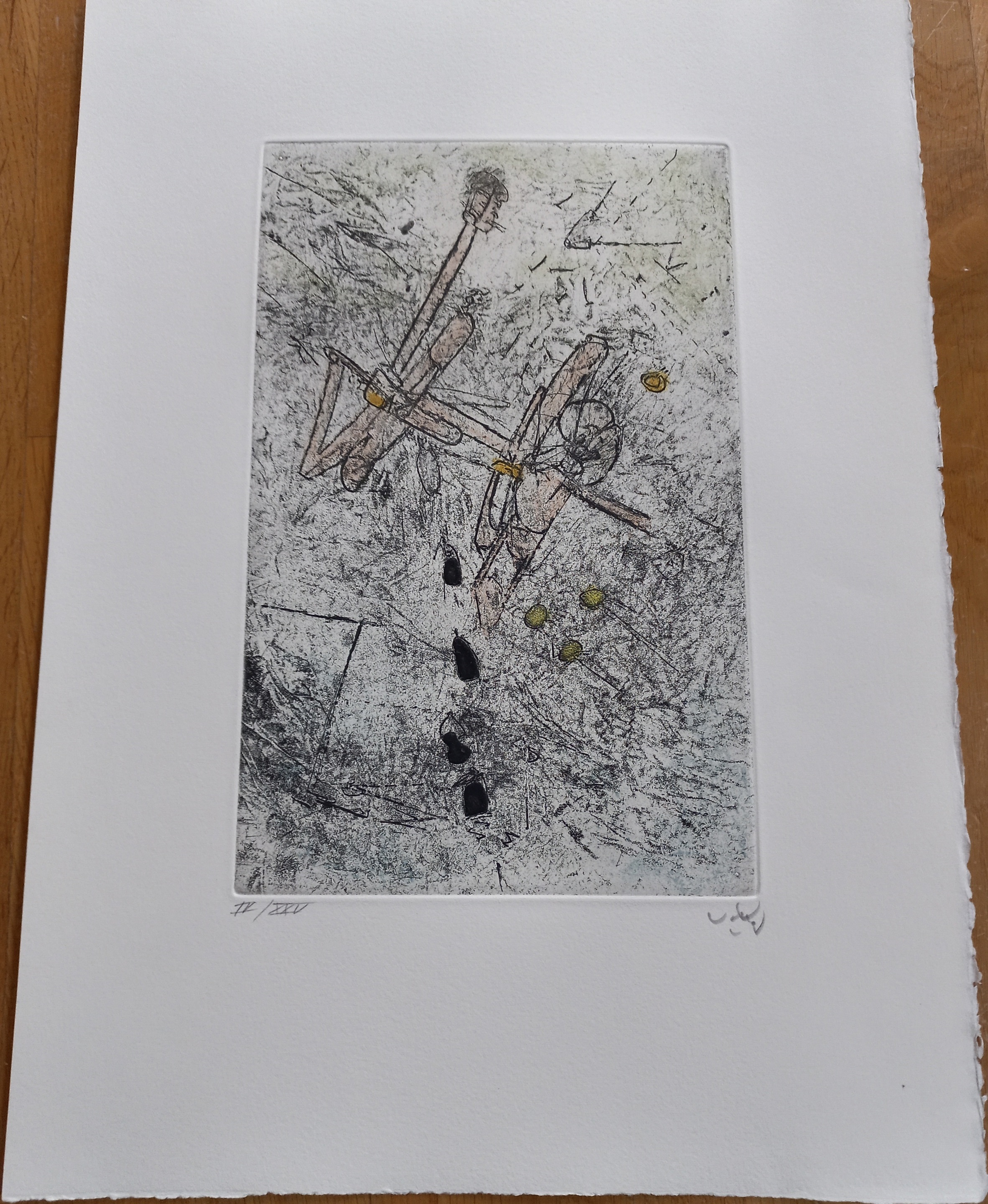 A black and white drawing on a piece of paper on a table.