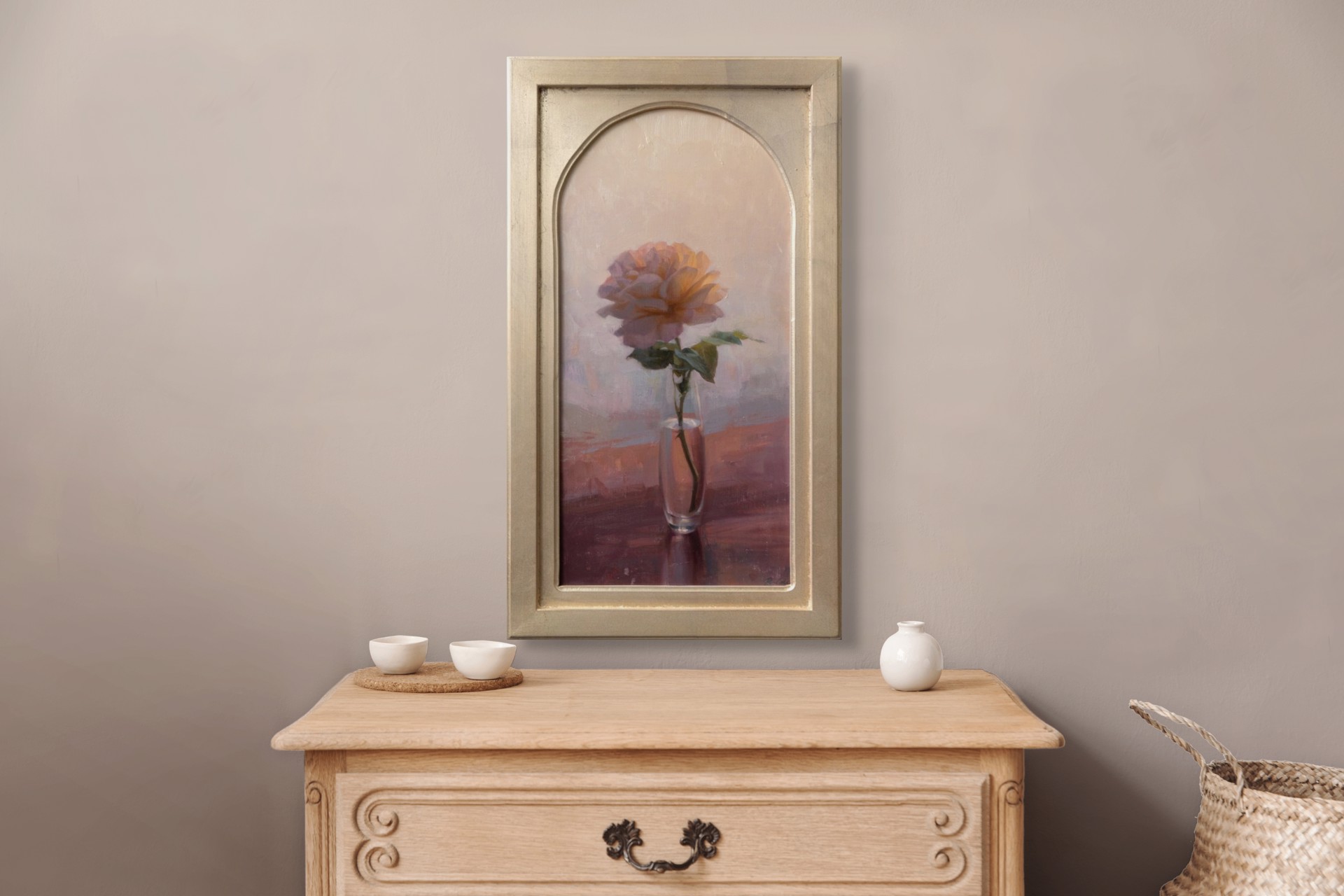 A soft, impressionistic still life of a single rose in a glass vase.