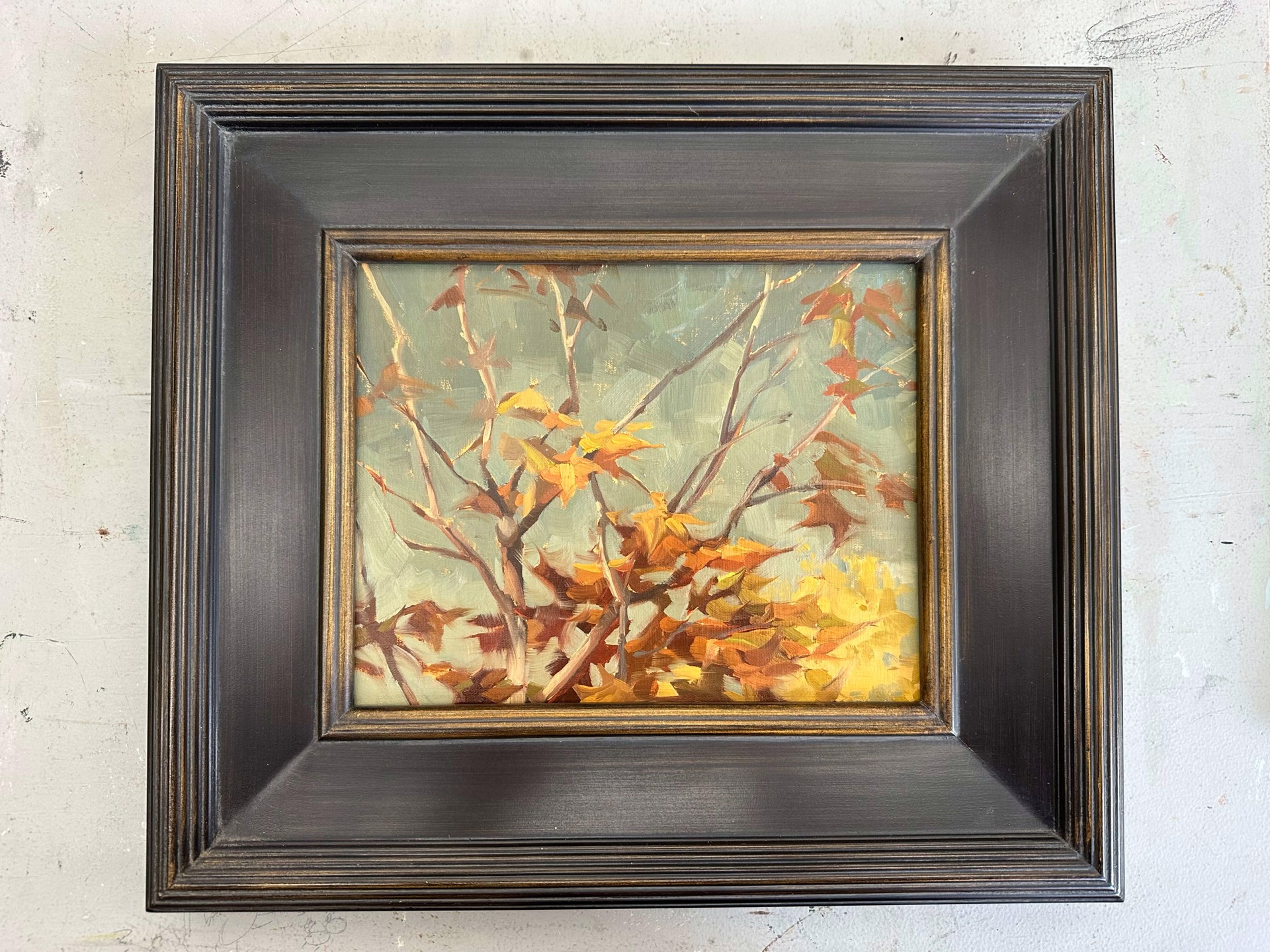 A painting of a tree with yellow leaves on it.