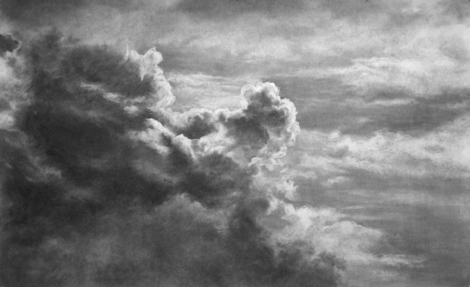 A black and white photo of a cloudy sky.