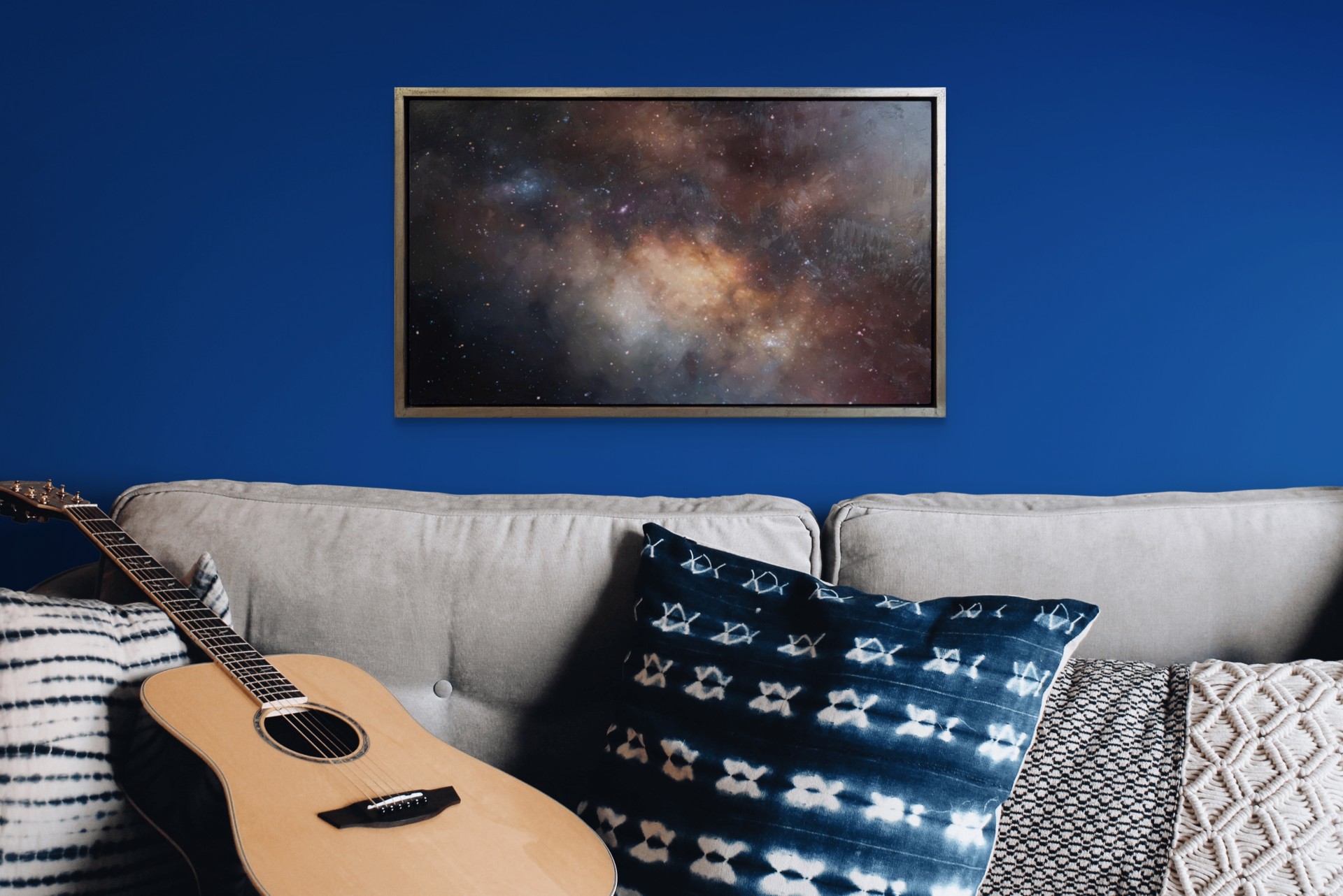 A cosmic nebula scene featuring a glowing central cloud surrounded by dark space and scattered stars.