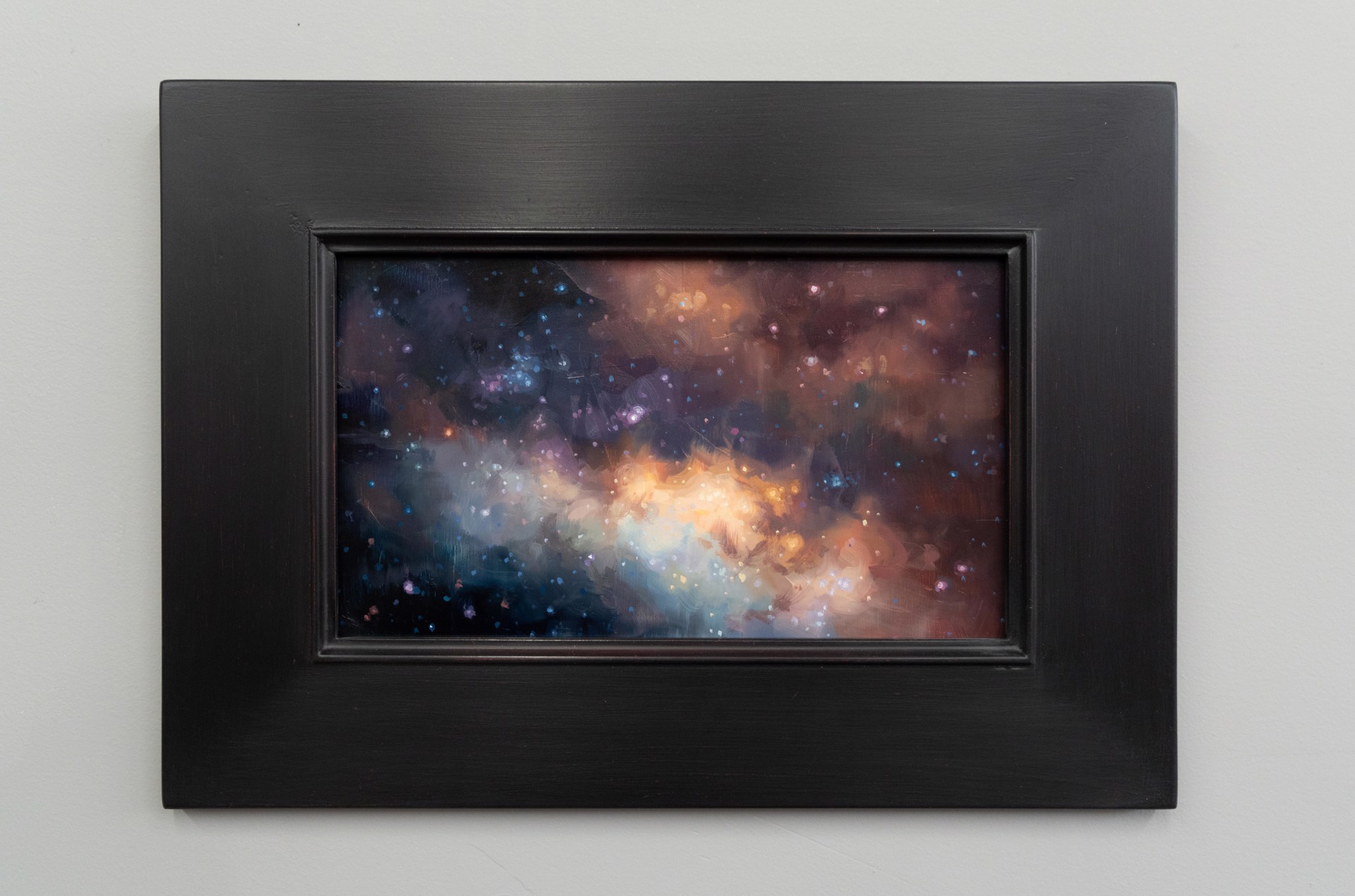 A cosmic nebula painting featuring swirling clouds of gas and starry space.