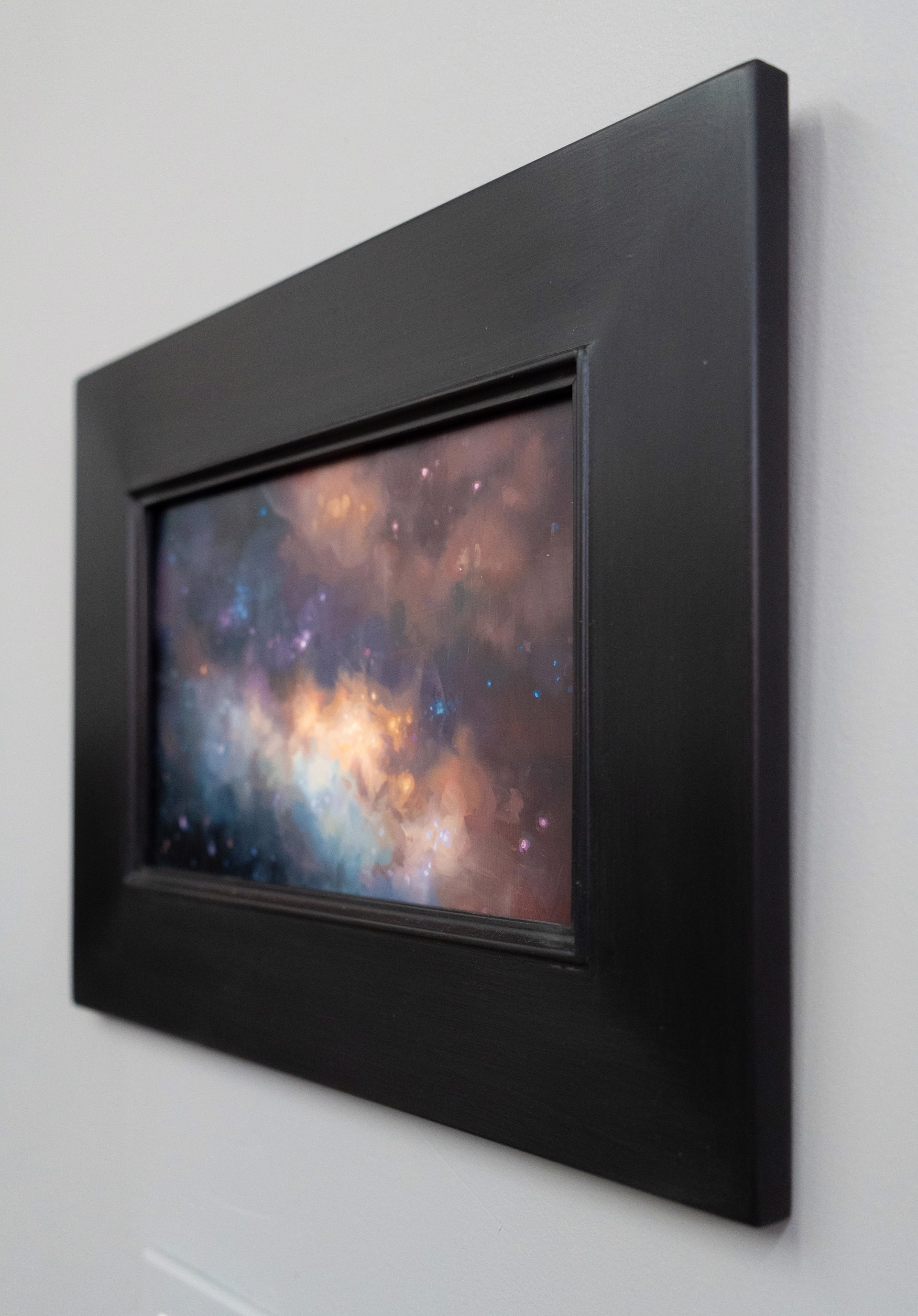 A cosmic nebula painting featuring swirling clouds of gas and starry space.