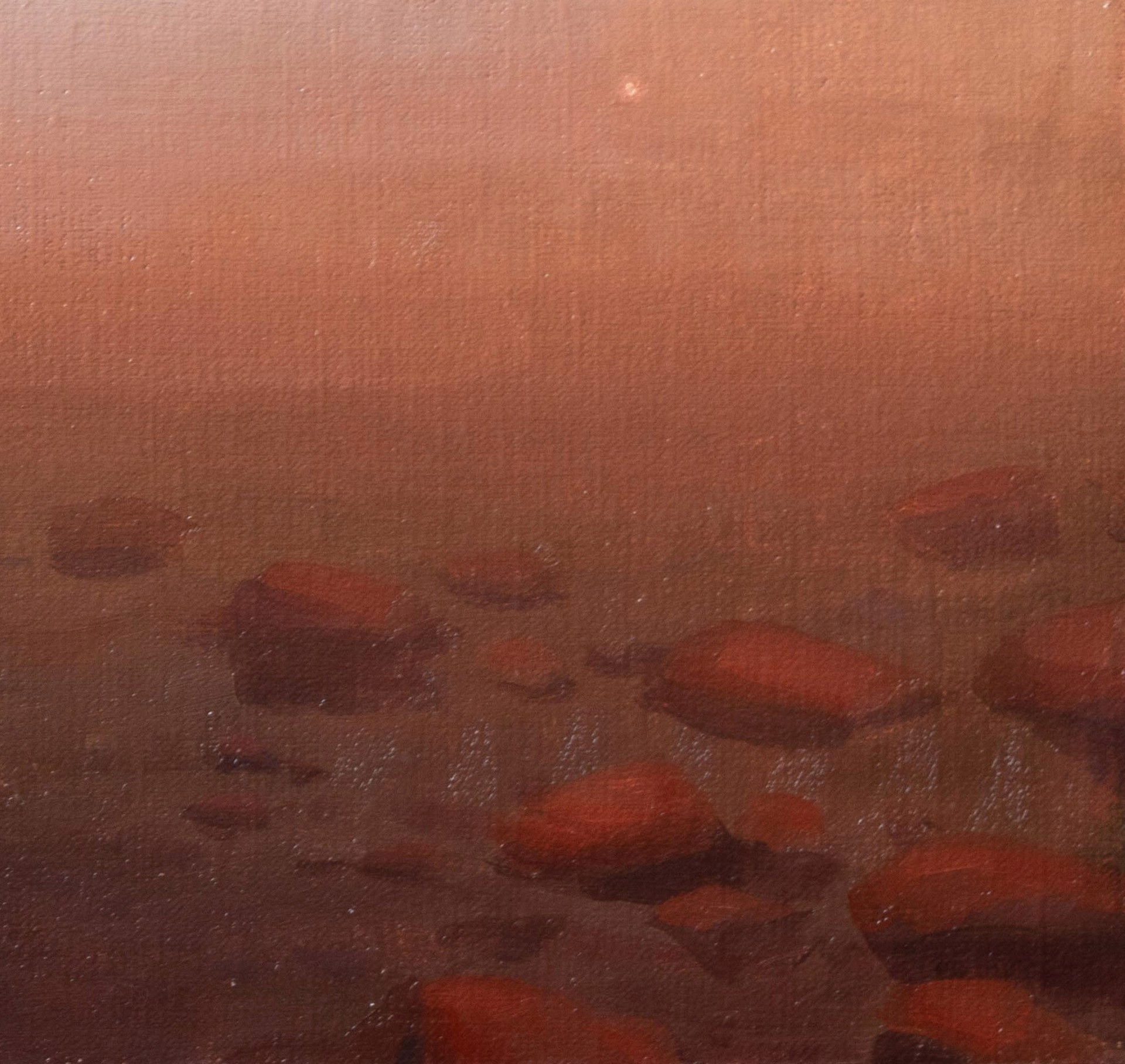 A hazy, atmospheric landscape featuring a rocky shoreline under an orange sky.