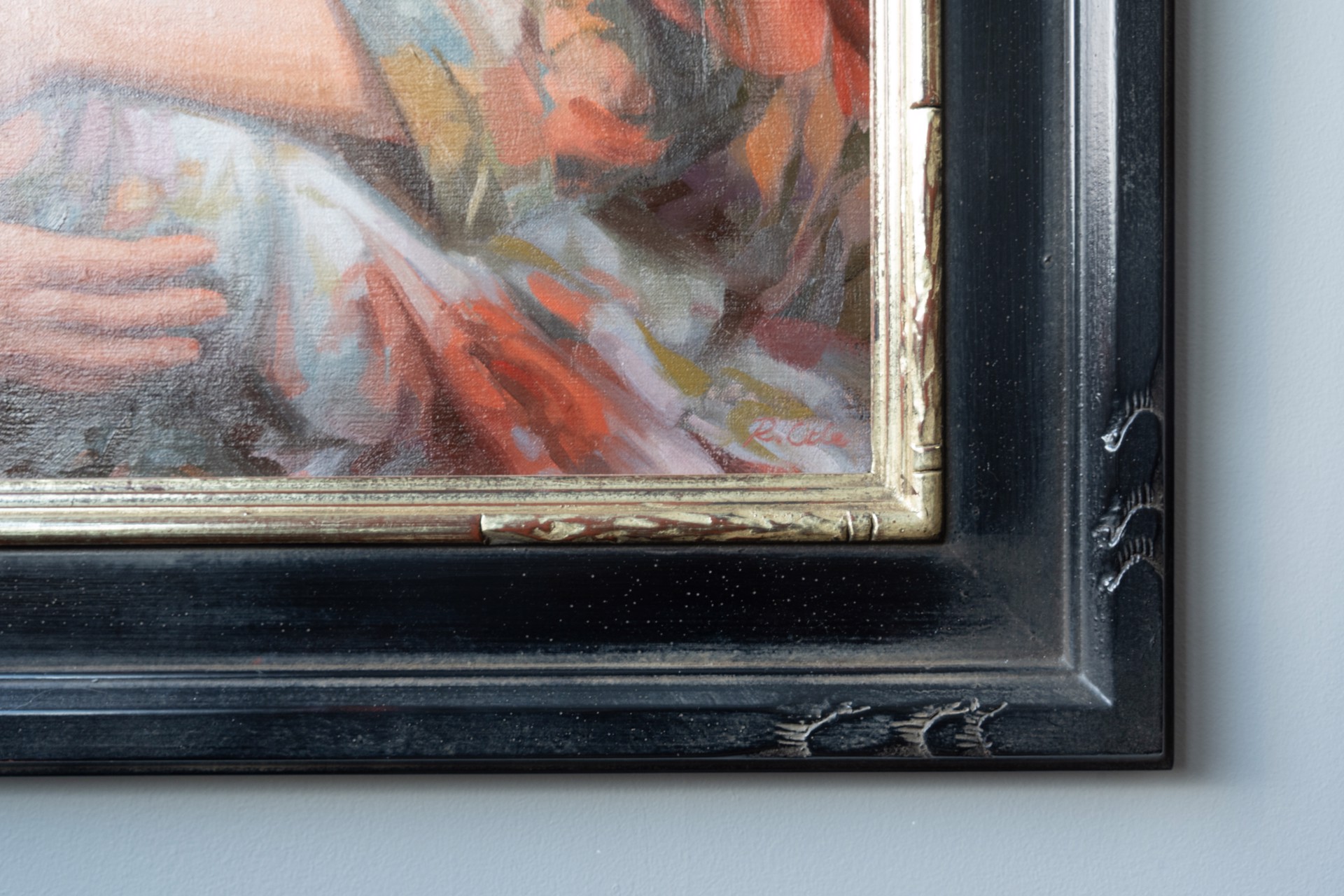 A painting of a woman holding a baby in her arms.