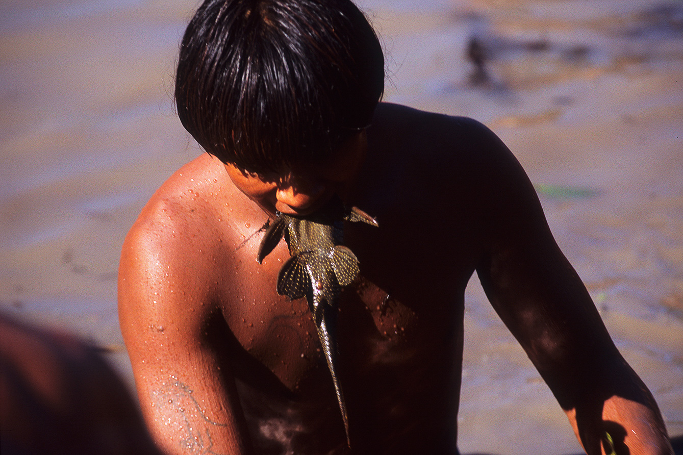 Waura Man on Piulaga Lake by Rosa Gauditano , 2005