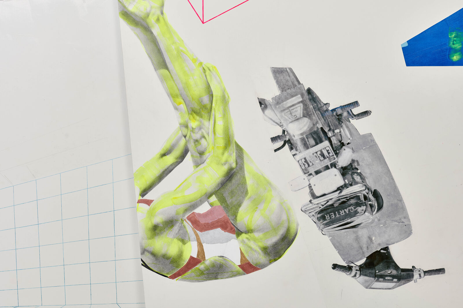 A piece of art hanging on a wall in a room.