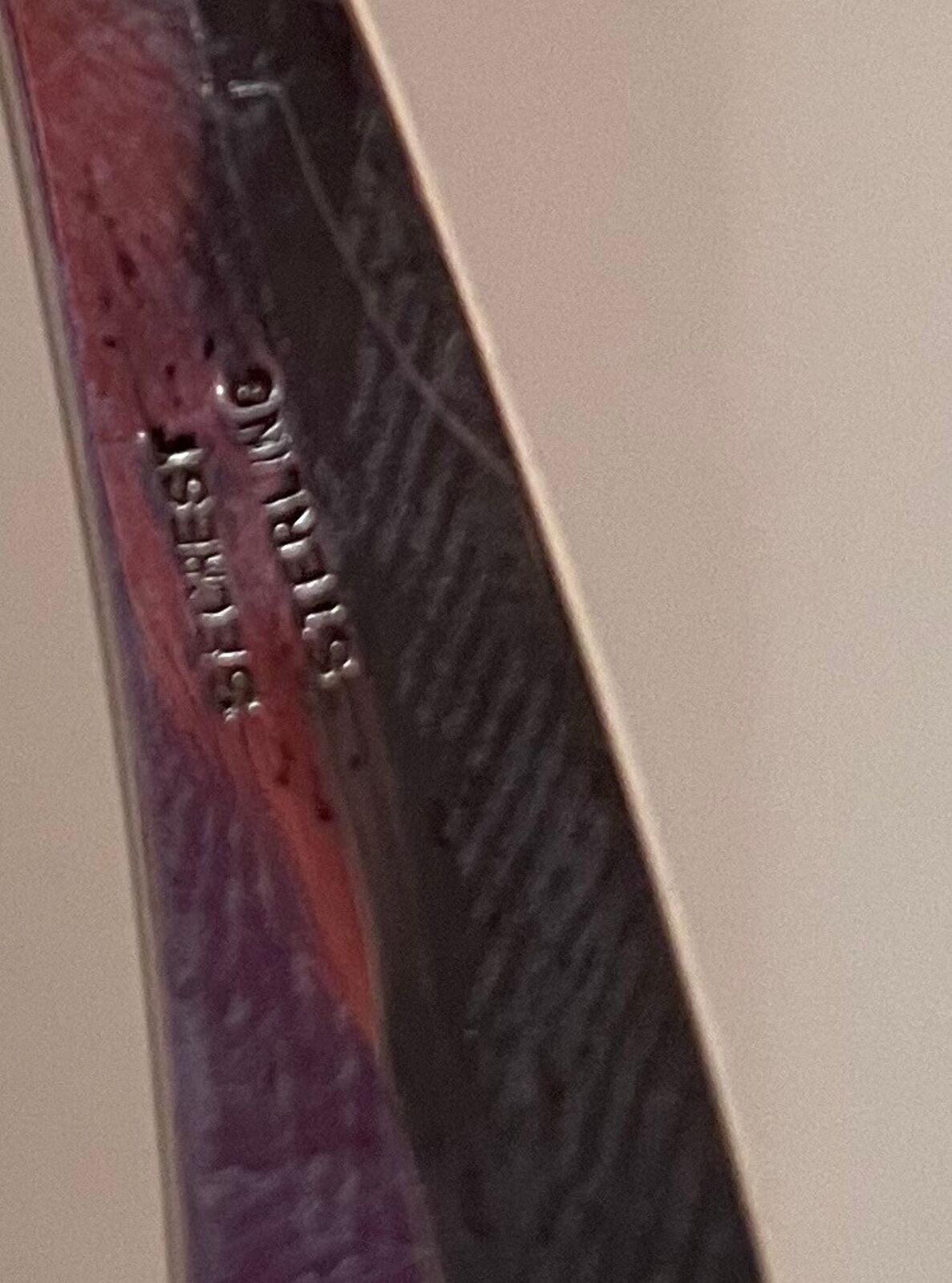 Artwork by Russell Secrest, Suspended Sculpture #3, Made of Sterling silver and wood 